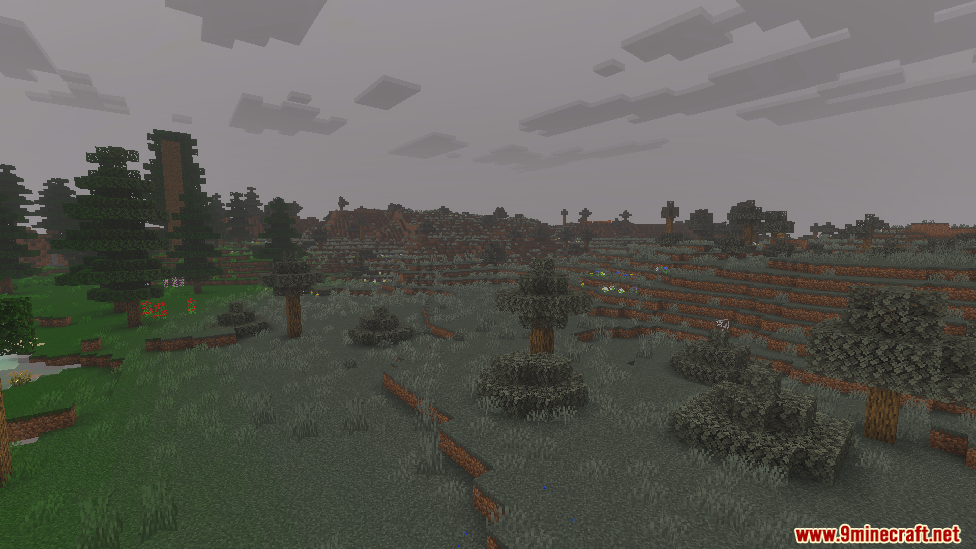 Horror Environment Addon Screenshot 4 A grey desolate biome with thick fog and sparse trees in Minecraft