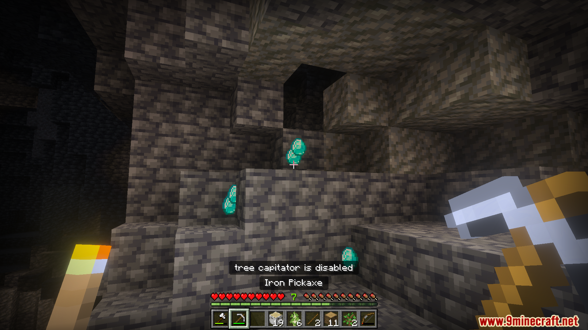 Howard Survival Addon Screenshot 9 Player exploring a cave with dynamic lighting and Howard Survival Addon features