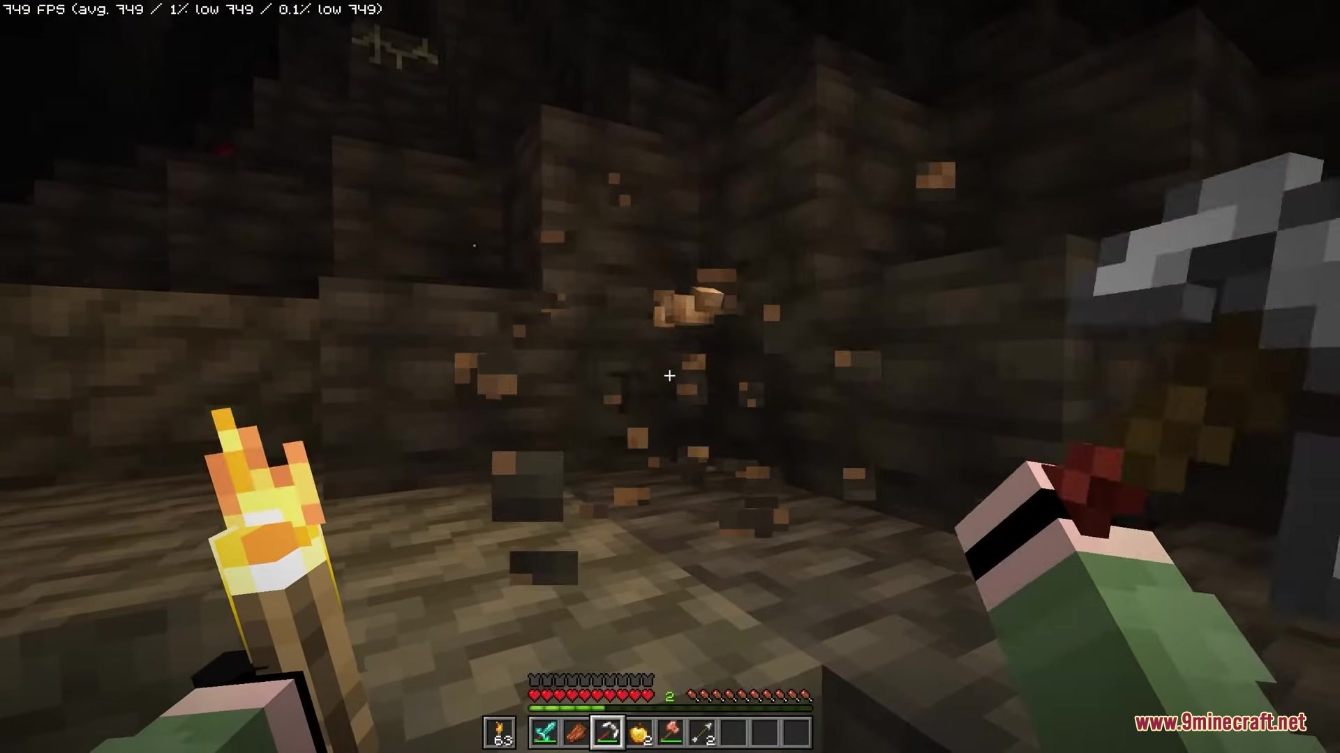 Hyper Punchy Resource Pack Screenshot 2 Minecraft player mining iron ore with a pickaxe in a dark cave