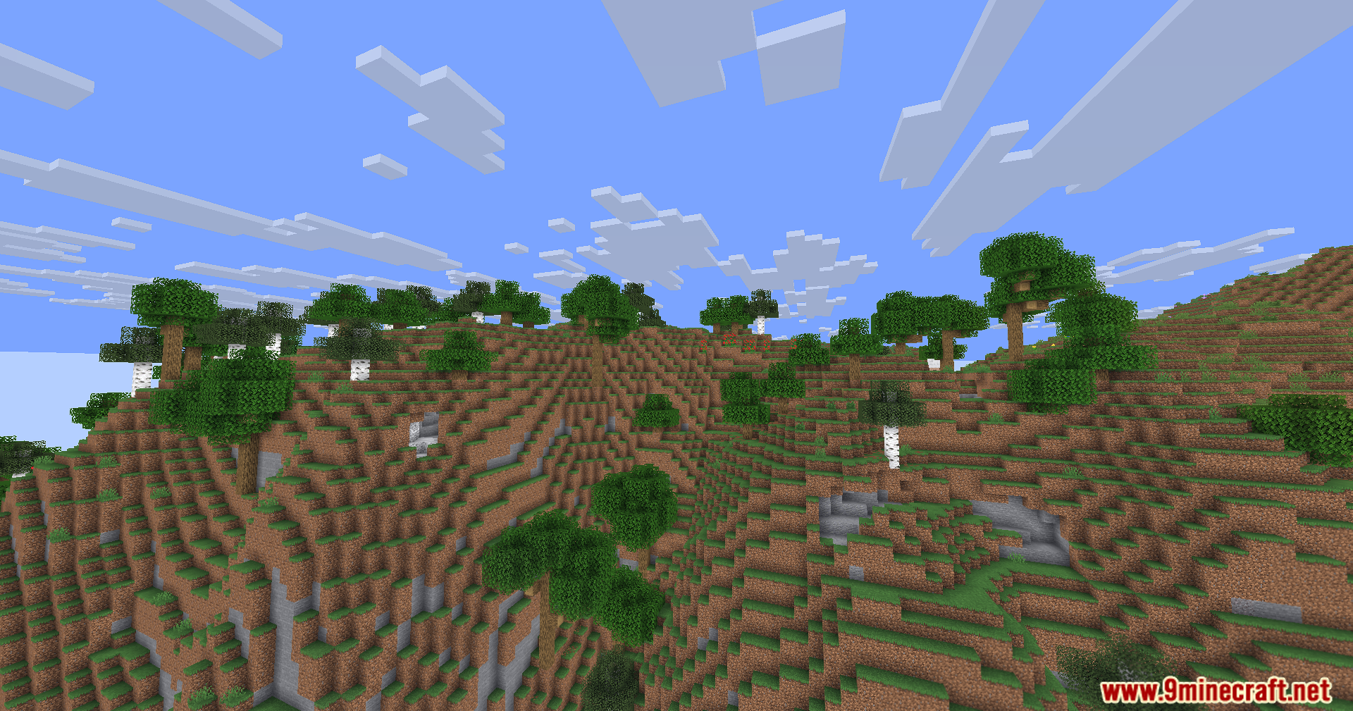 Minecraft landscape with blurry foreground birch trees and sharp distant hills and sky