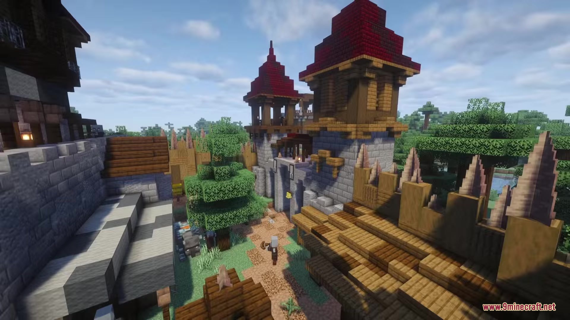 Illager Structures Mod Screenshot 10 An illager walks through the courtyard of a fortified stone and wood base