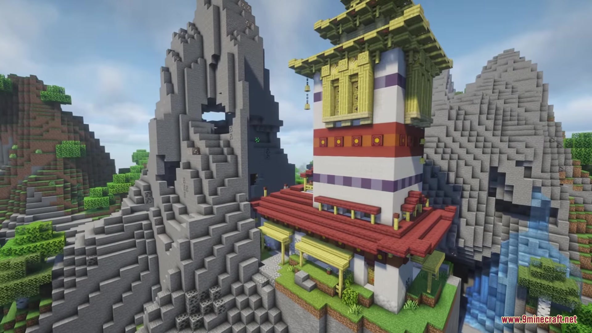 Illager Structures Mod Screenshot 16 A tall colorful monk tower built into the side of a mountain
