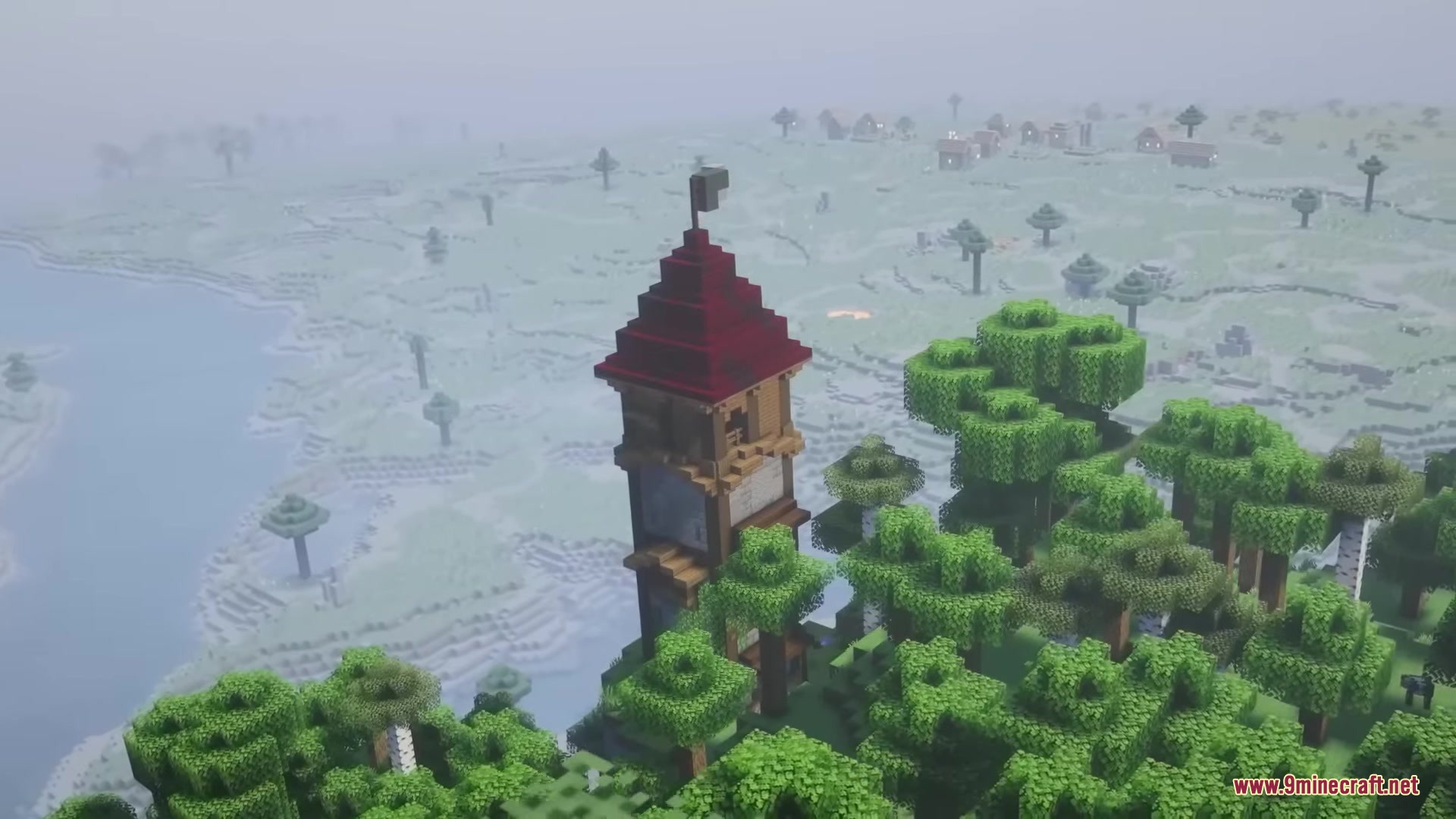Illager Structures Mod Screenshot 3 A tall Minecraft watchtower with a red roof stands in a foggy forest