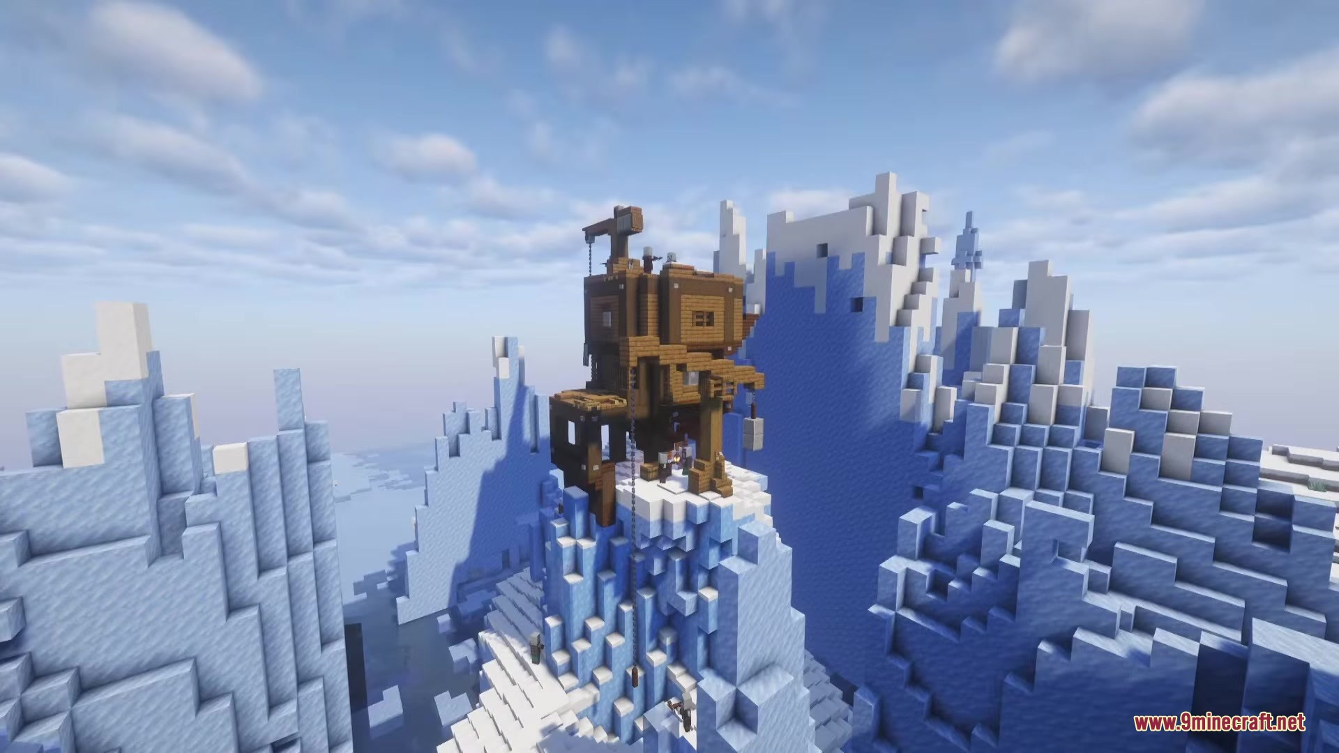 Illager Structures Mod Screenshot 7 A wooden industrial building perched on a high snowy mountain peak