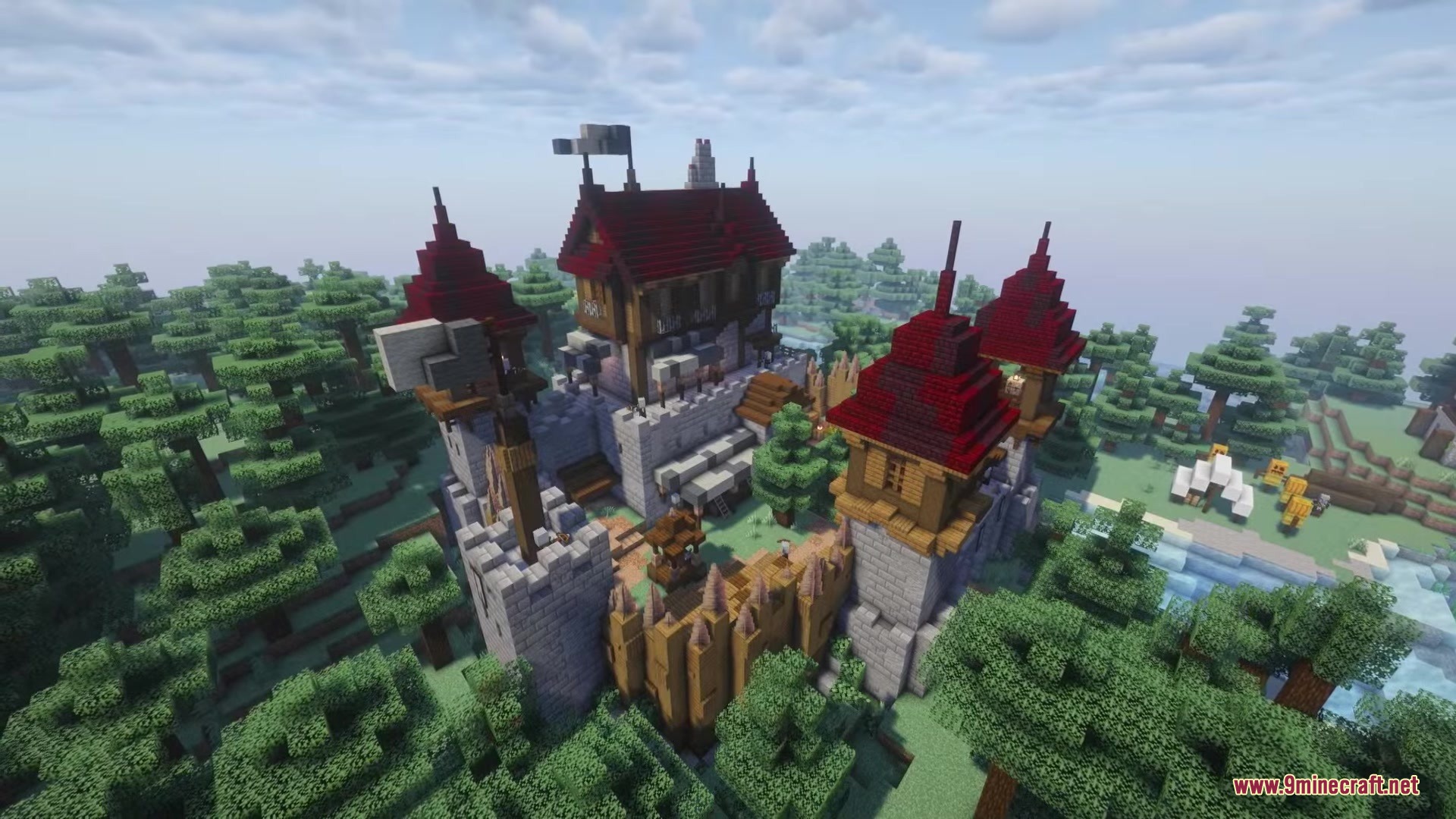 Illager Structures Mod Screenshot 9 A large illager settlement with red roofs surrounded by a dense green forest