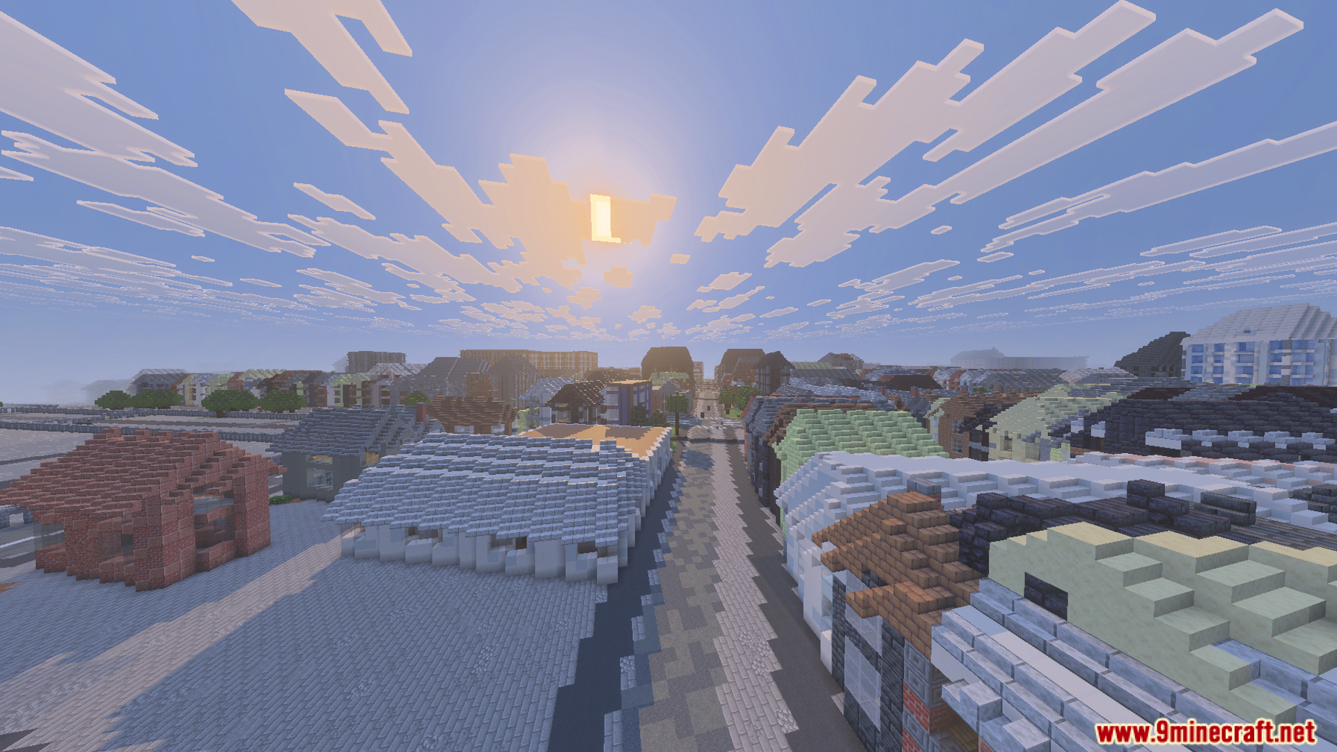 An aerial view of the massive scale model city under a bright sun