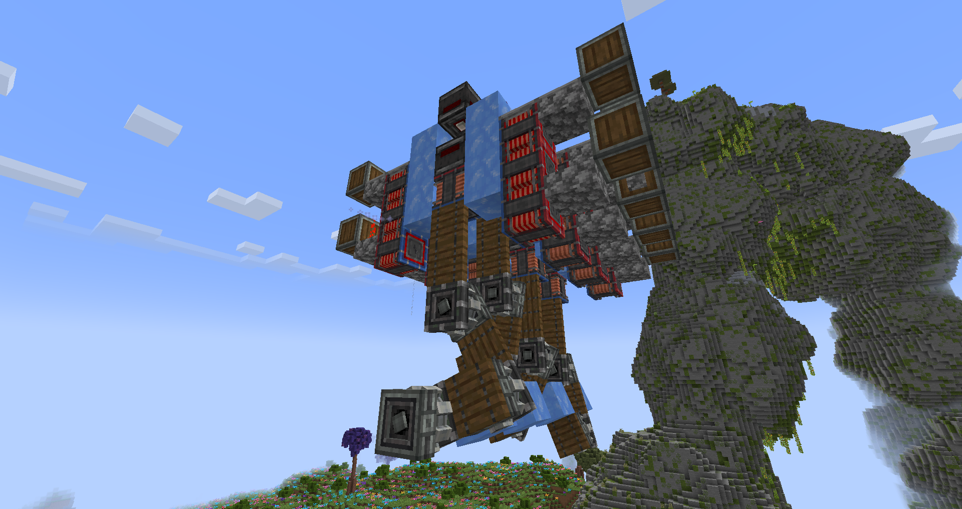Complex mechanical engine built with pistons and shafts in a Minecraft world