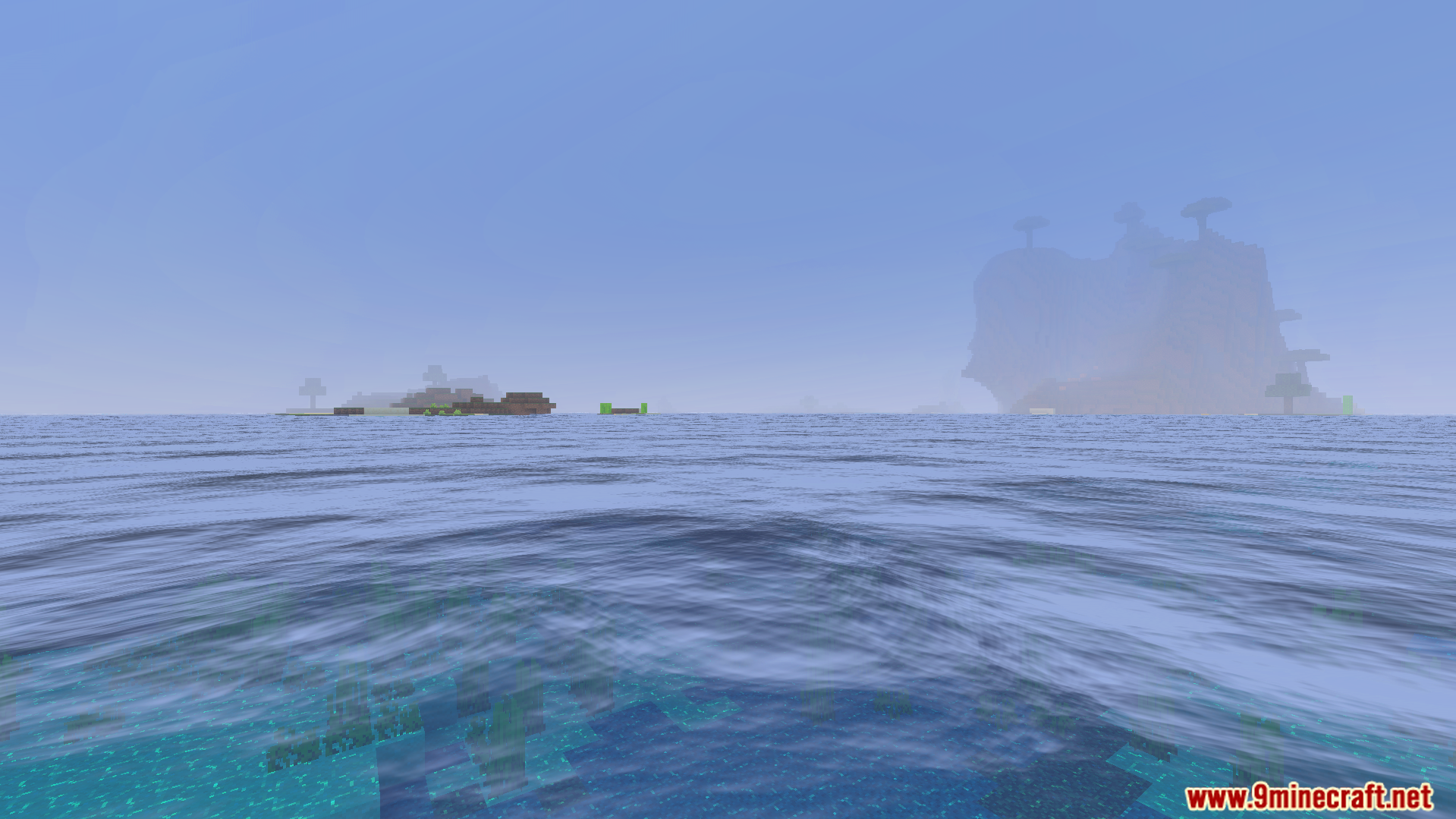 Vast ocean with gentle waves and realistic reflections under a foggy sky