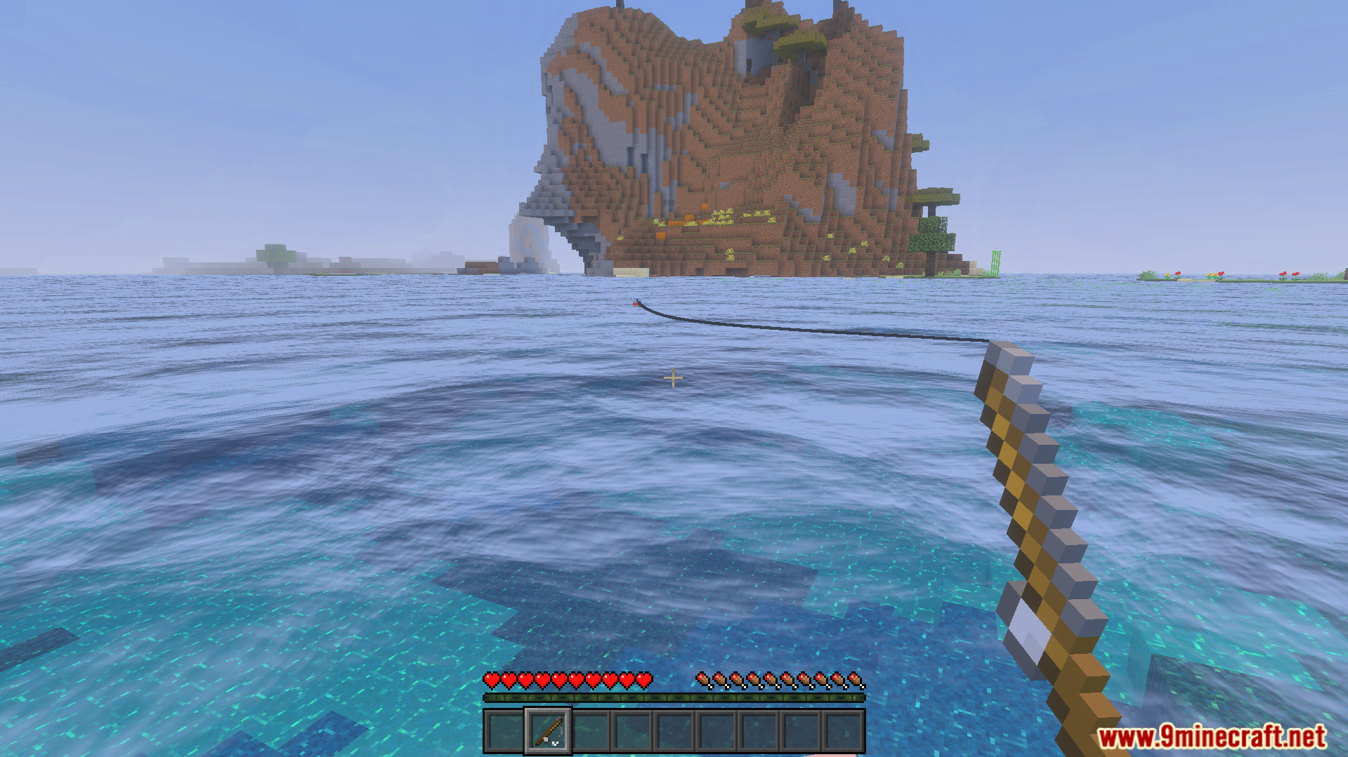 Fishing in the ocean with realistic water reflections and gentle surface waves