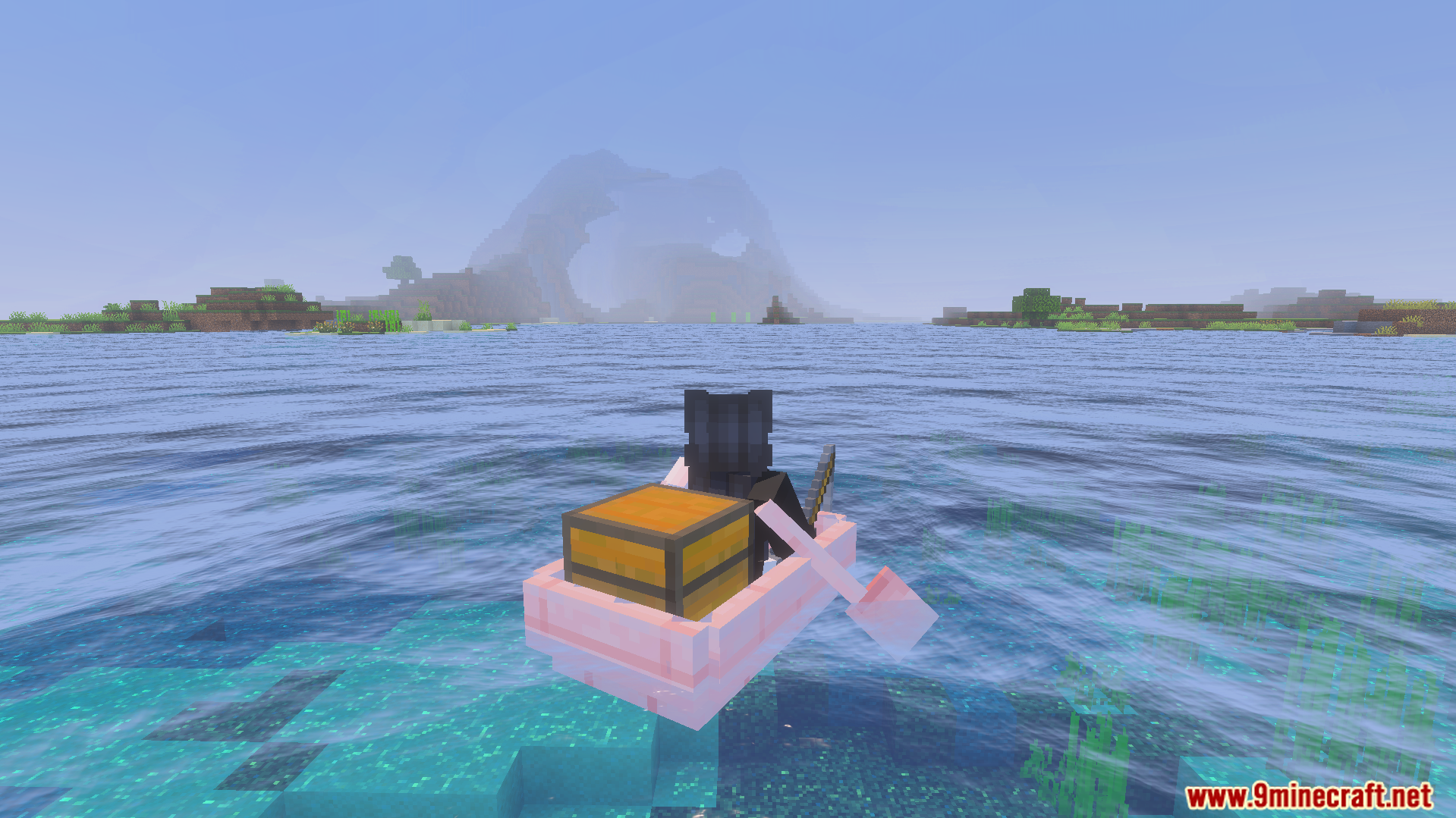 Player rowing a pink boat with a chest on water with gentle waves