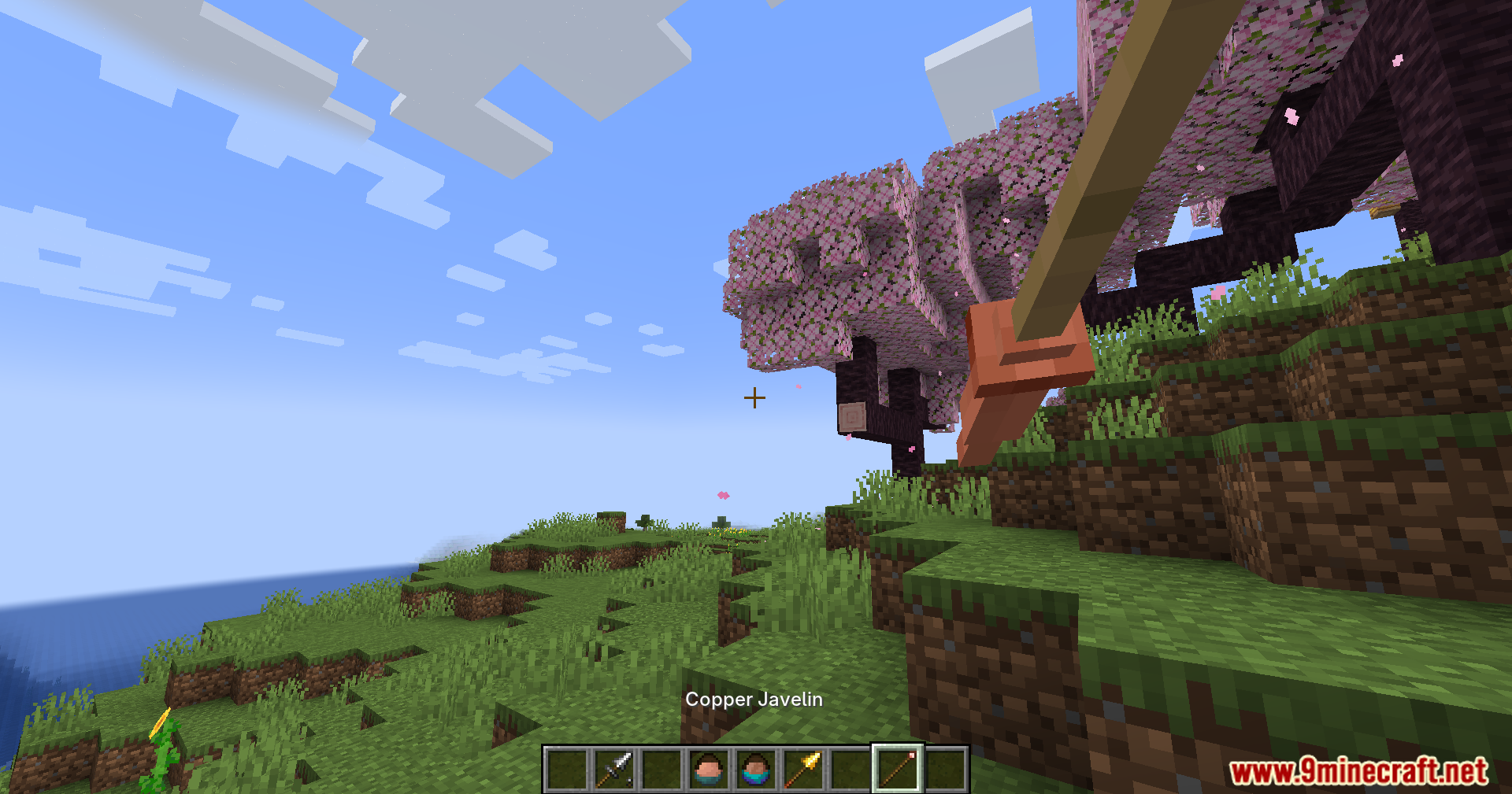 Jerotes Warehouse Mod Screenshot 16 Player holding a copper javelin in a cherry blossom forest biome