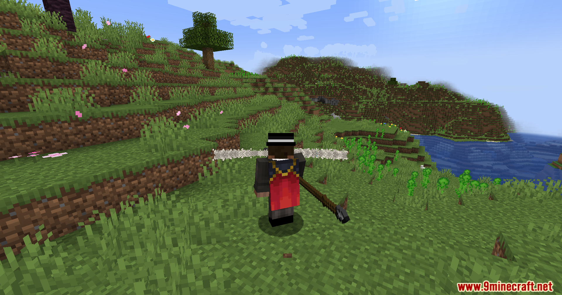 Jerotes Warehouse Mod Screenshot 5 A Minecraft player wearing a red cape and holding a long wooden pike