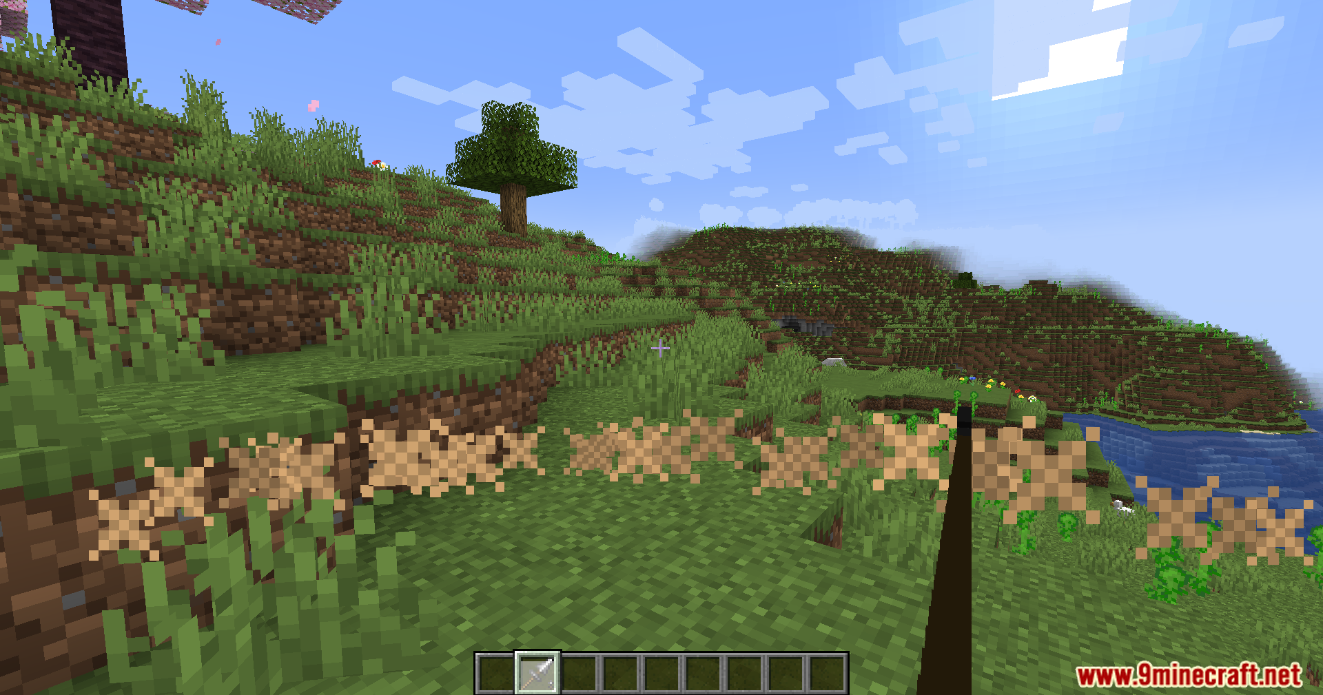 Jerotes Warehouse Mod Screenshot 7 A player using a pike weapon that creates brown cross shaped particles