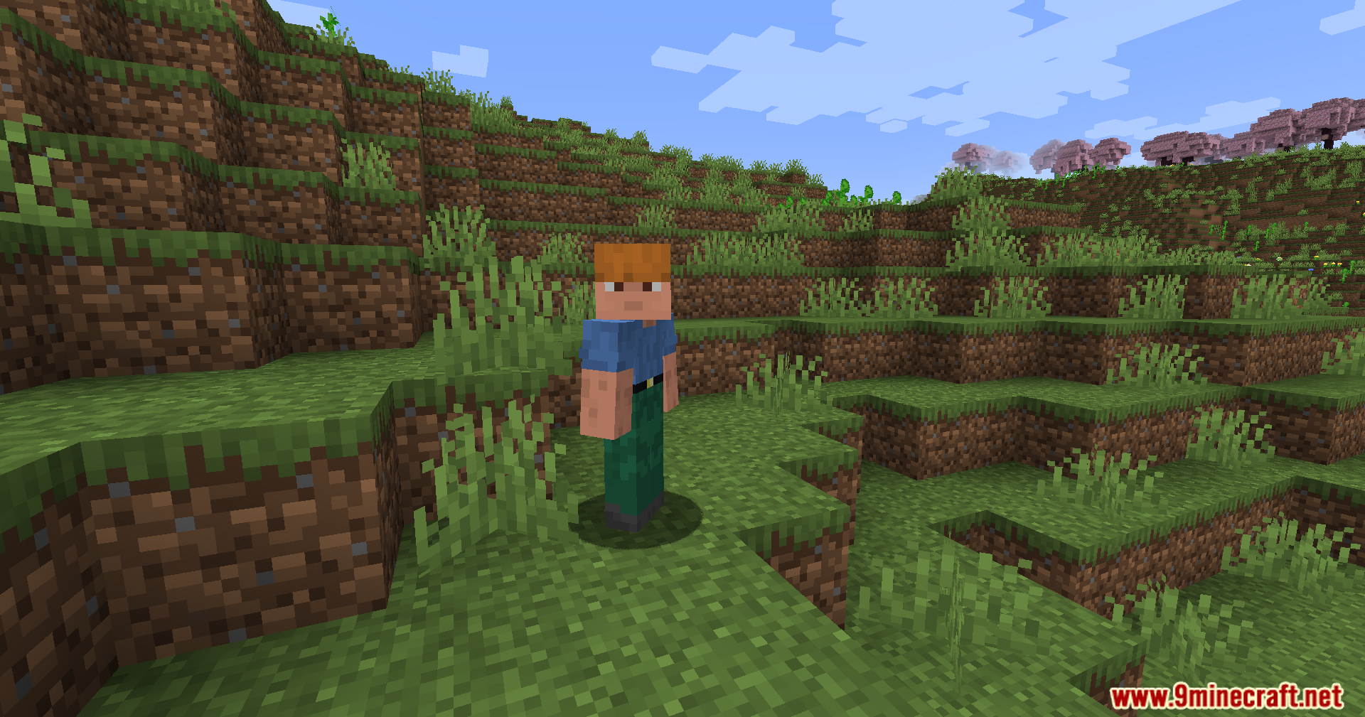 Jerotes Warehouse Mod Screenshot 9 A Minecraft character with orange hair and blue shirt standing on a grassy hill