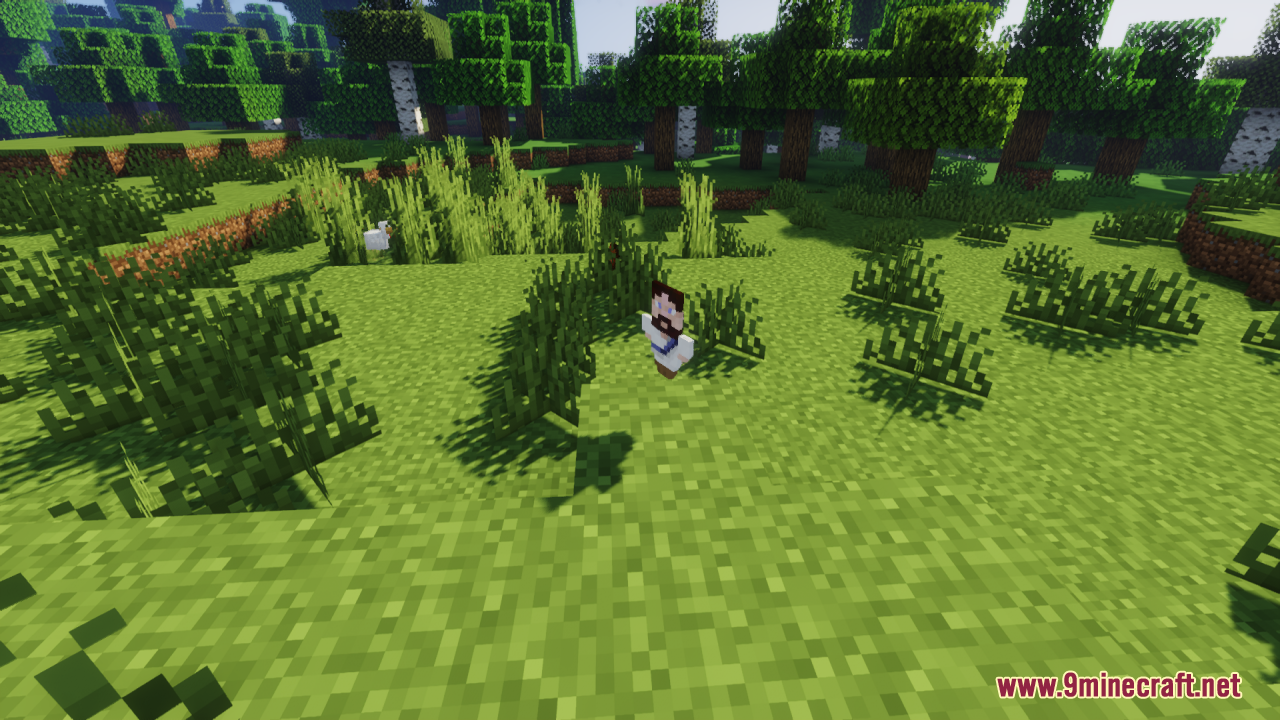 A small Jesus figure standing on a grass block in the forest