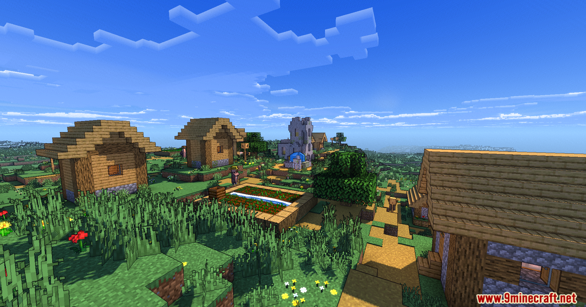 A village farm and houses rendered with cartoon style cel shaded effects