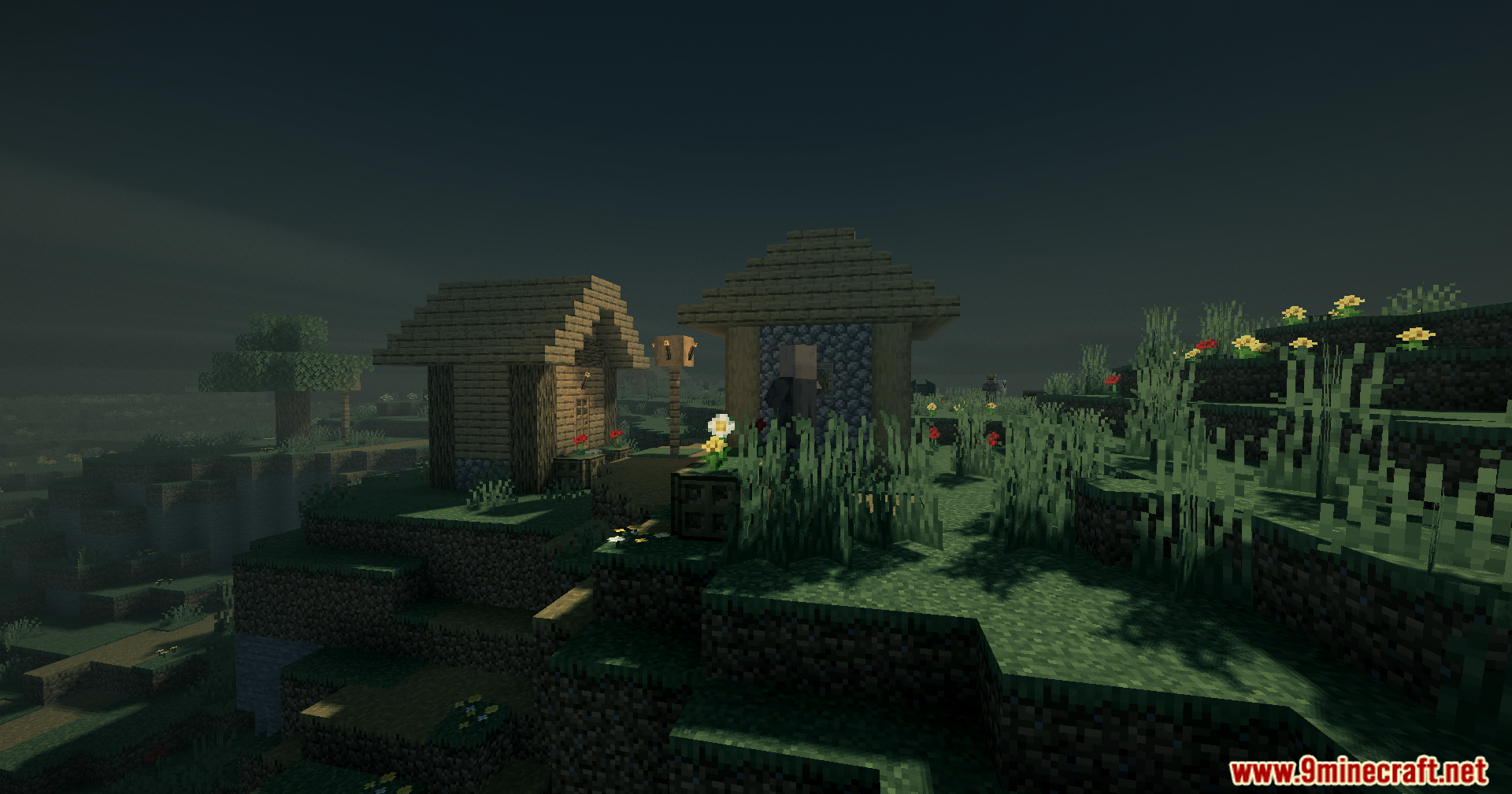 A villager stands near small wooden houses in a dark foggy landscape