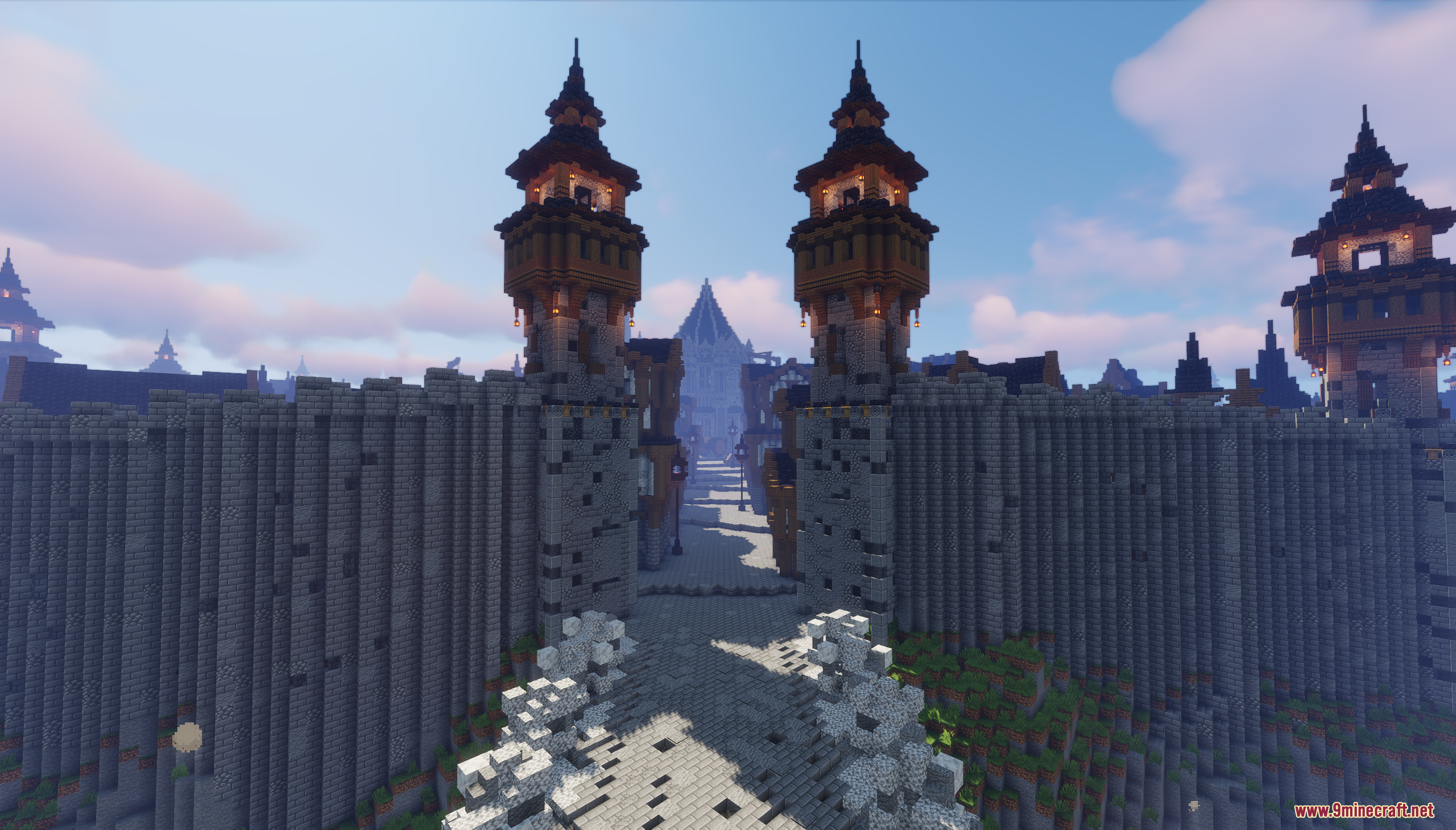 Detailed view of the main entrance gate with tall stone towers