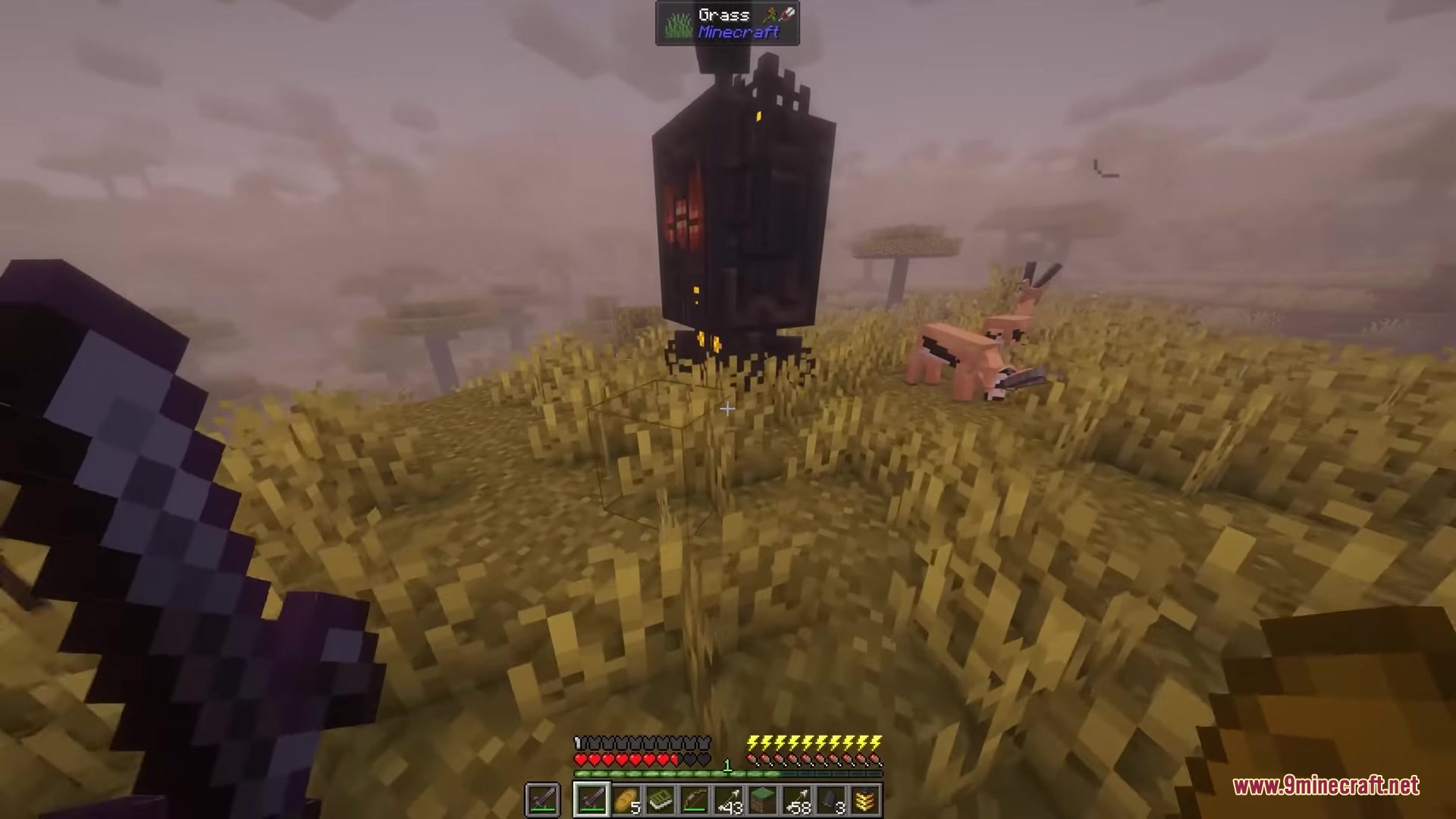 Player holding a netherite sword encounters a giant mechanical robot in the savanna
