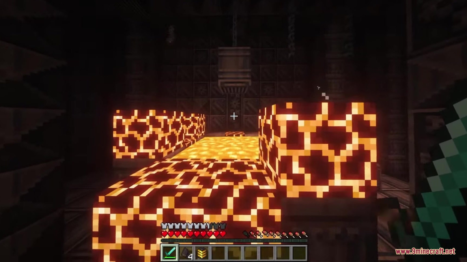 A player explores dark futuristic ruins with glowing orange mechanical blocks