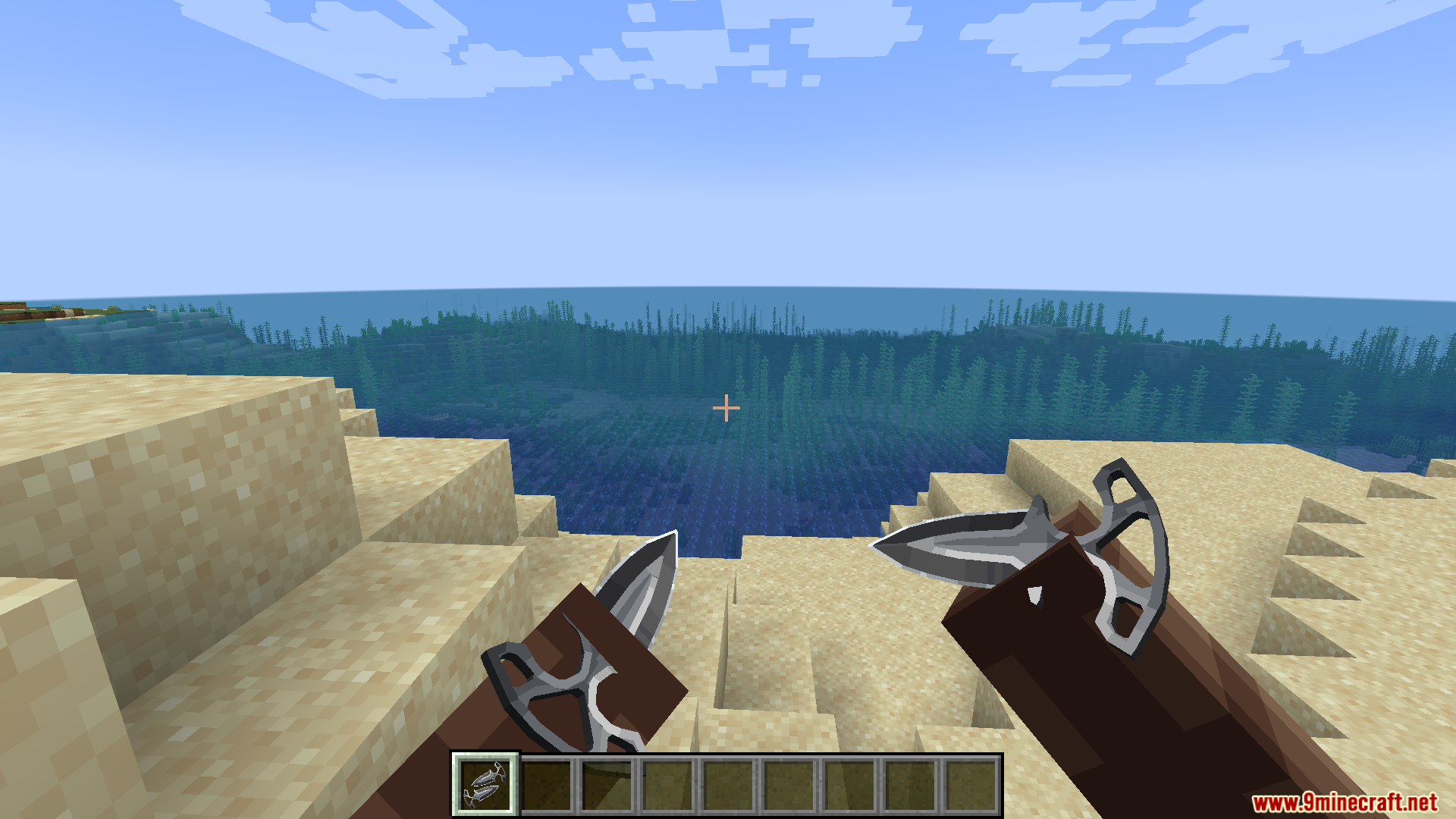 A player dual wielding skeleton knives while standing on a sandy beach