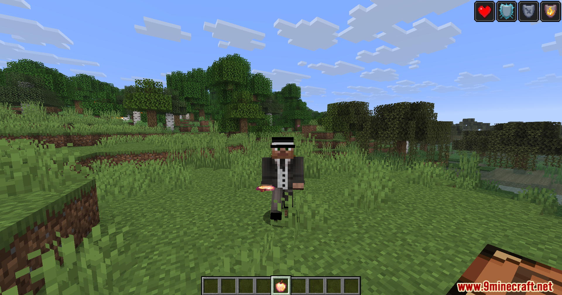 Player character in a suit holding an Enchanted Golden Apple with status effects