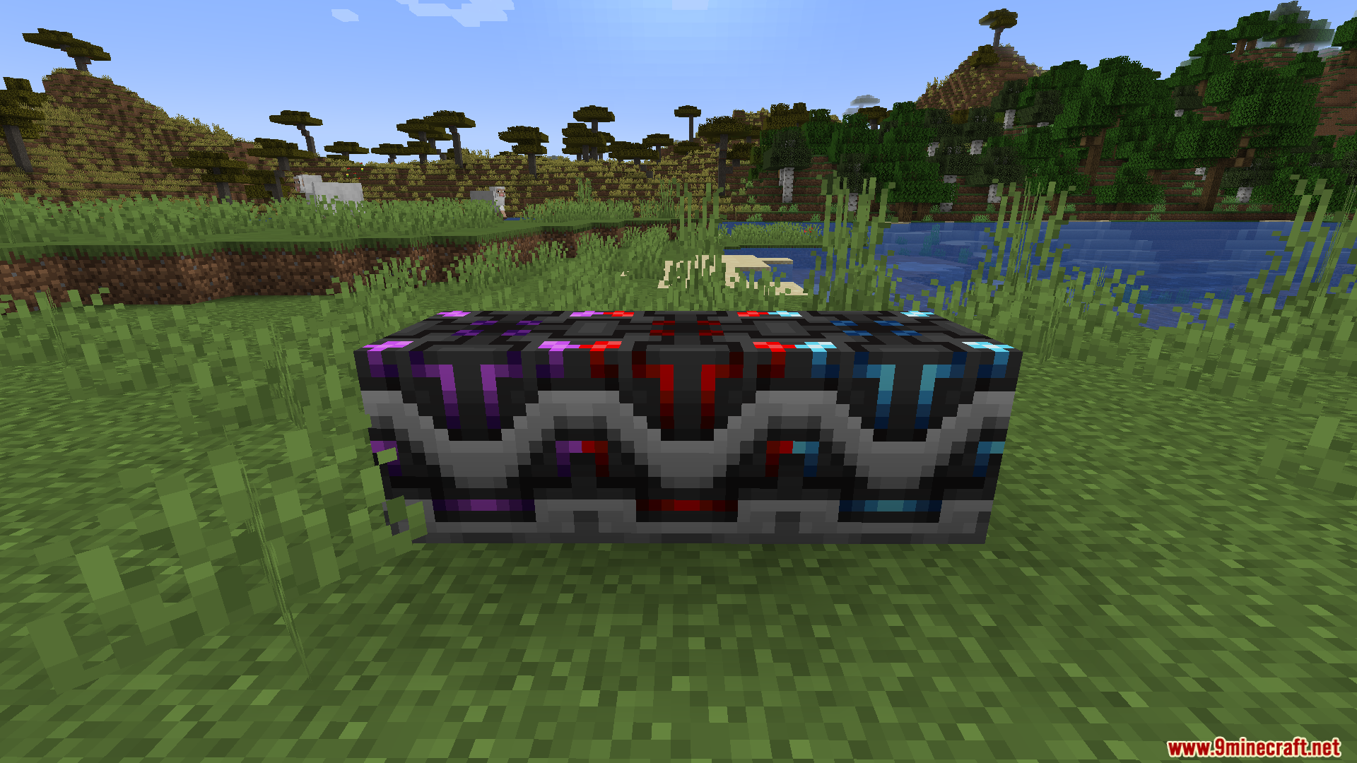 Little Big Redstone Mod Screenshot 7 Three microchip blocks with glowing colorful patterns placed on green grass