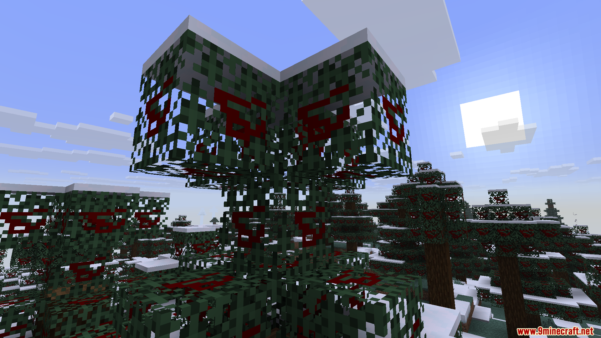 Snowy spruce trees with custom red patterns painted on the leaf blocks