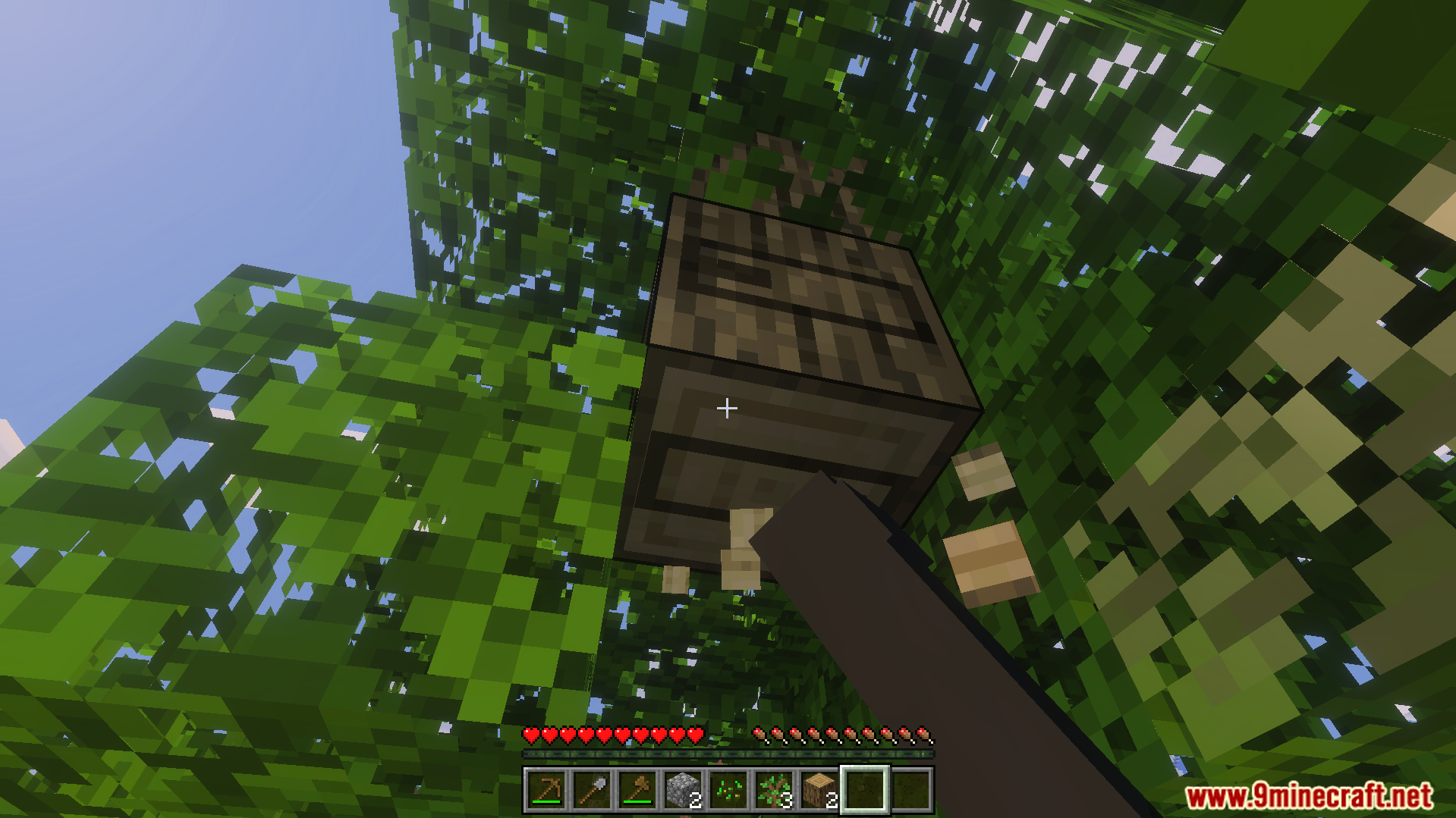 Player mining a tree log using the Loading Block Breaking Animation Texture Pack