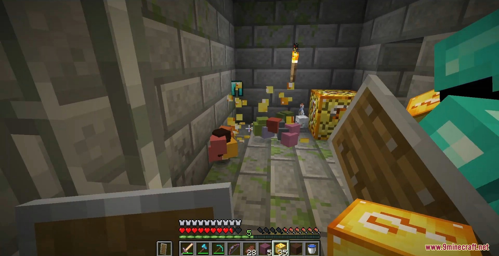 Colorful wool blocks and items scatter across the floor of a stone dungeon