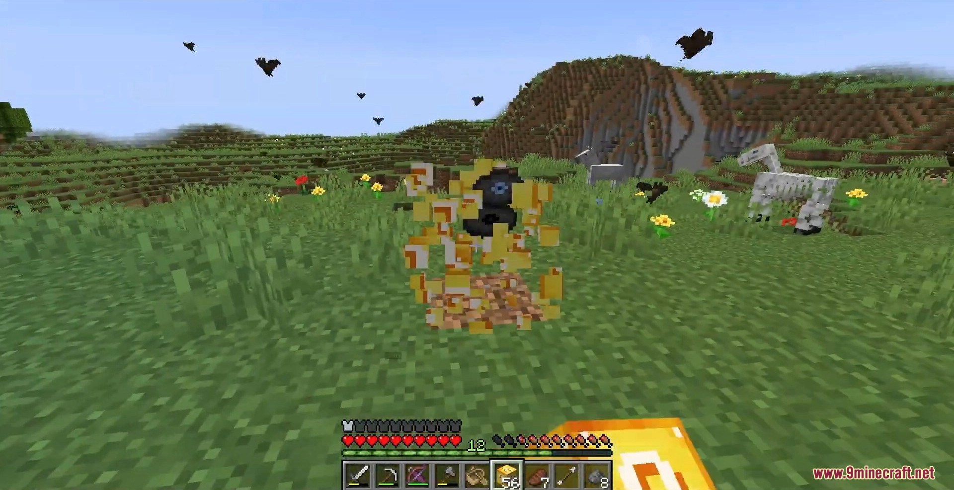 A dark mob spawns on the grass surrounded by glowing yellow particles