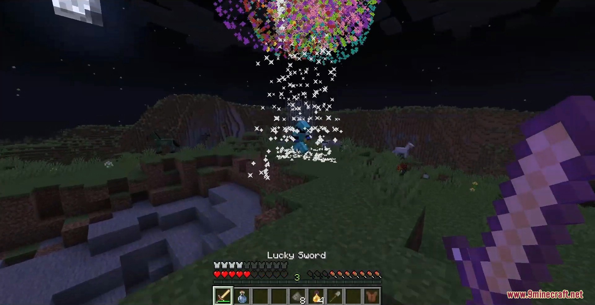 Colorful fireworks explode in the dark night sky above a player holding a sword