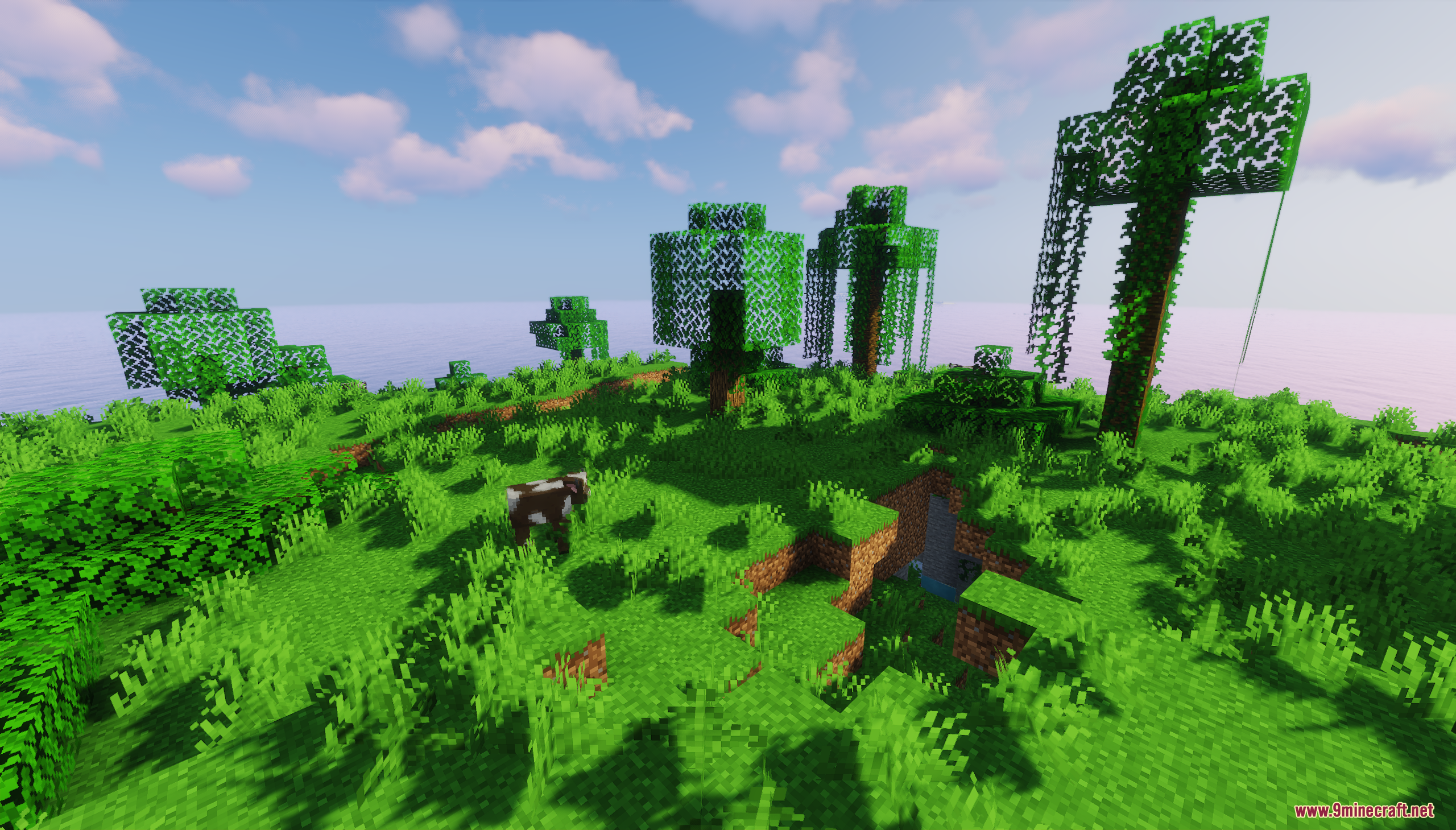 Luz Island Map Screenshot 3 A cow grazes on a grassy hill with trees and a cave