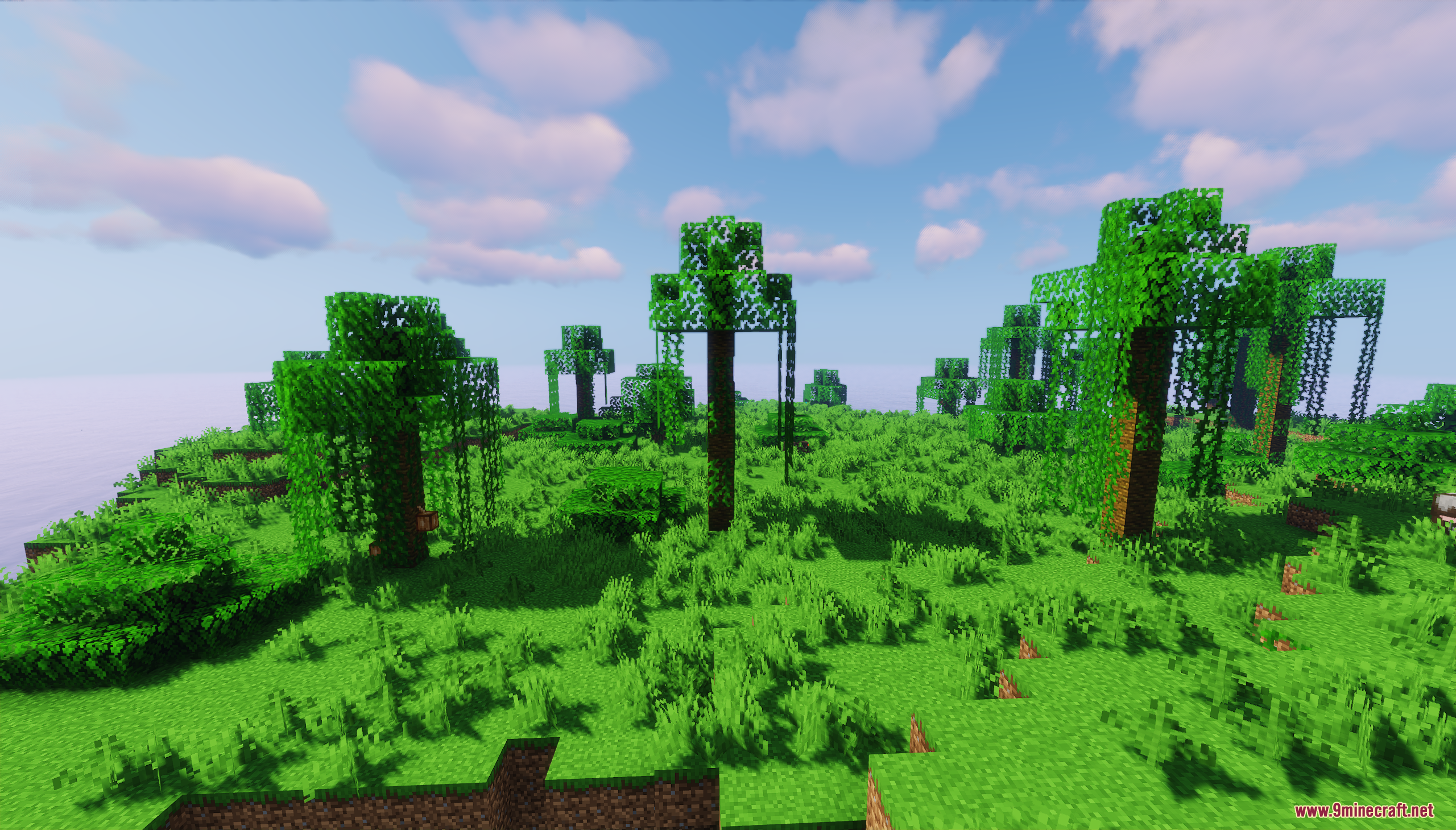 Luz Island Map Screenshot 6 Tall trees with hanging vines grow across the grassy island landscape