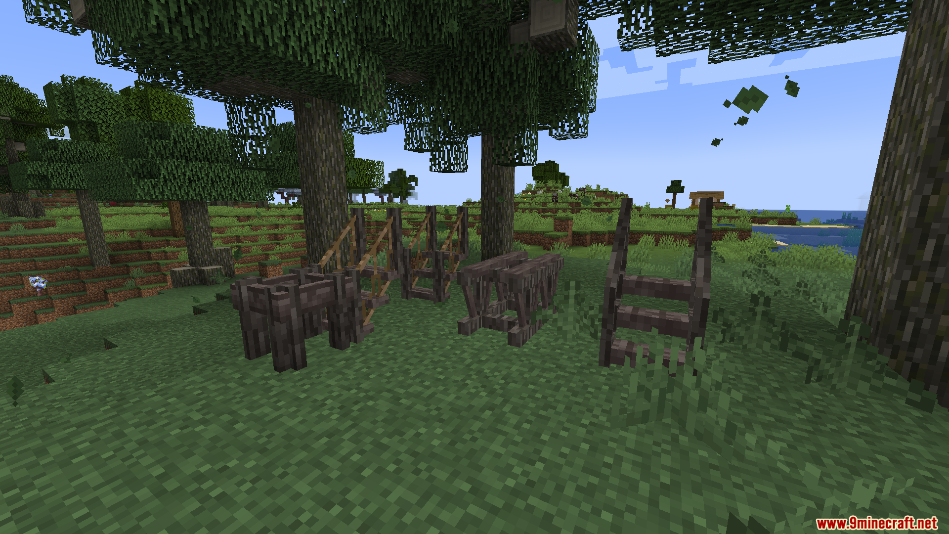 Macaws Regions Unexplored Mod Screenshot 4 Dark wooden bridge and stair structures placed on grass under large trees