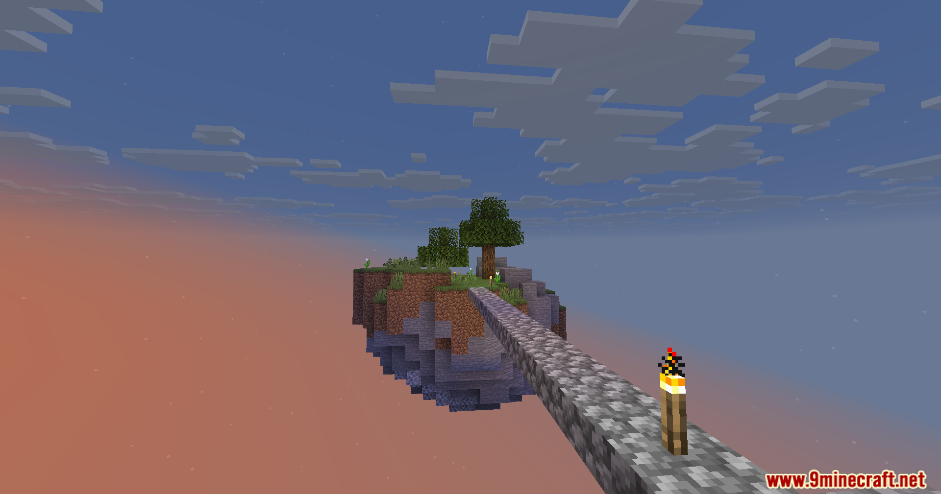 A floating island with trees connected by a long cobblestone bridge