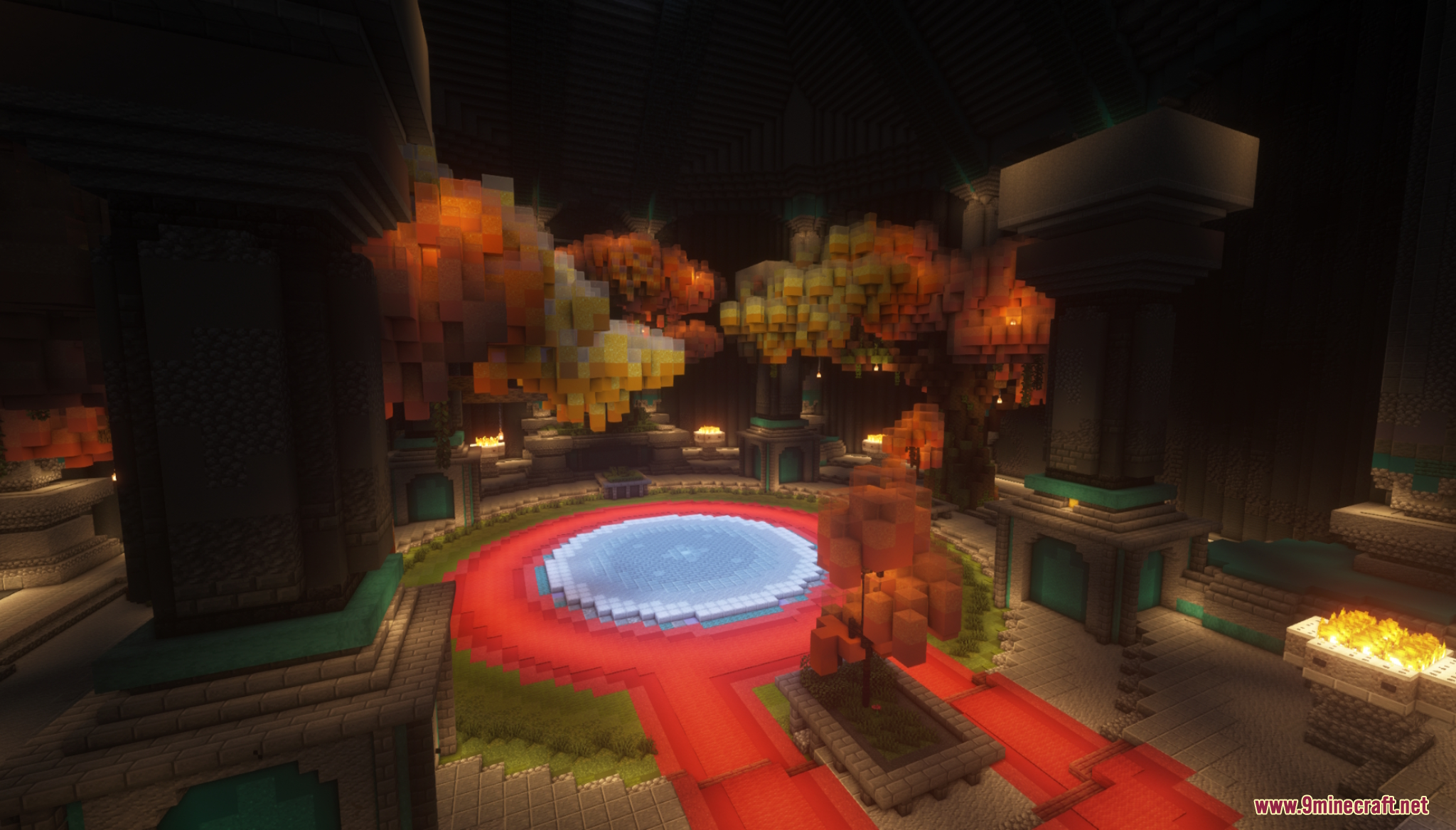 Circular indoor room with a central pool and glowing orange trees