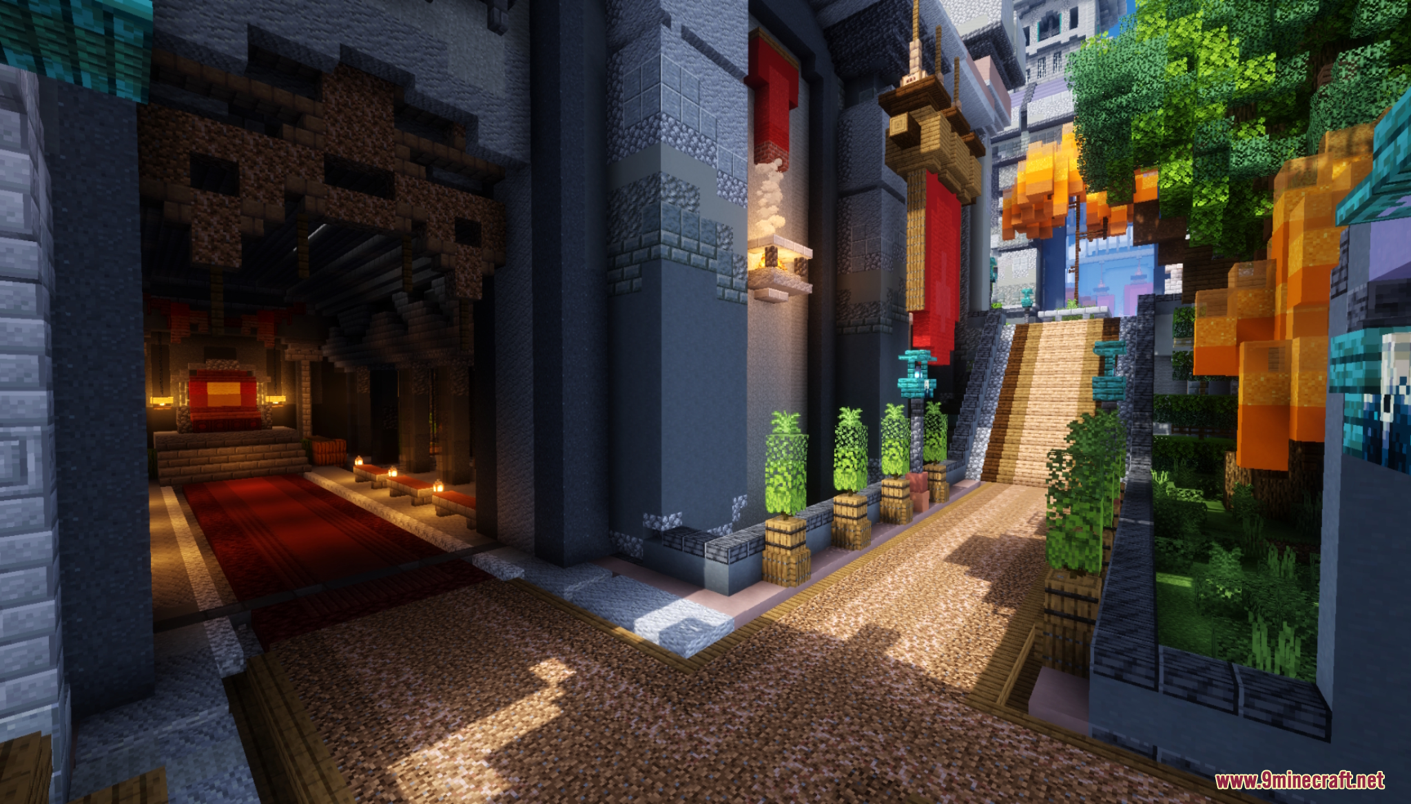 A red carpet leads to a throne inside a grand stone structure