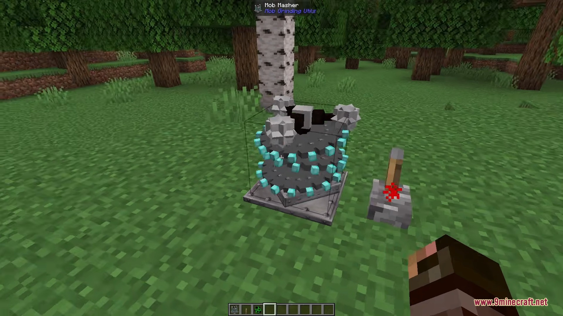 A Mob Masher block with spikes activated by a lever on grass