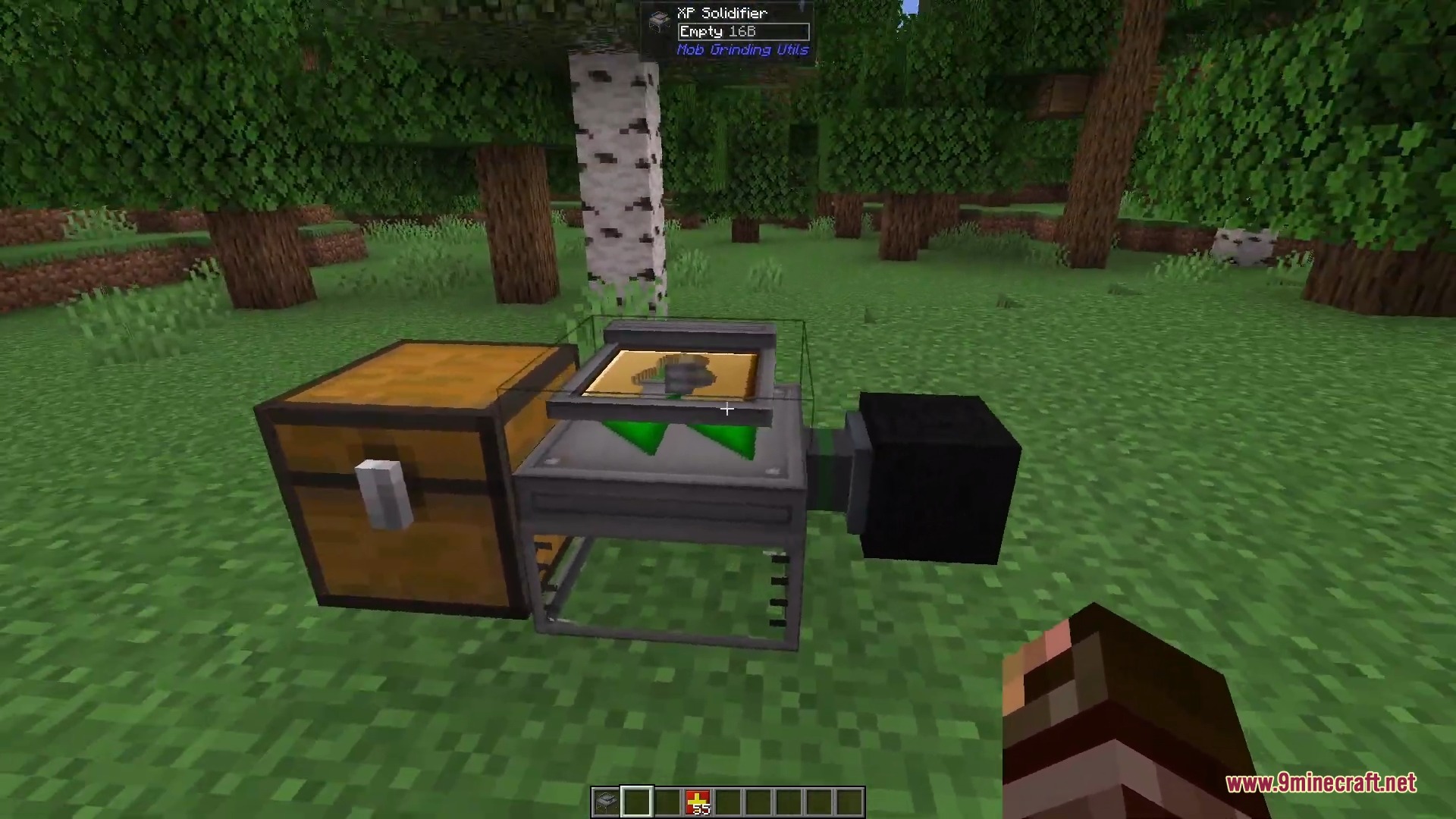 The XP Solidifier block connected to a wooden chest in the forest