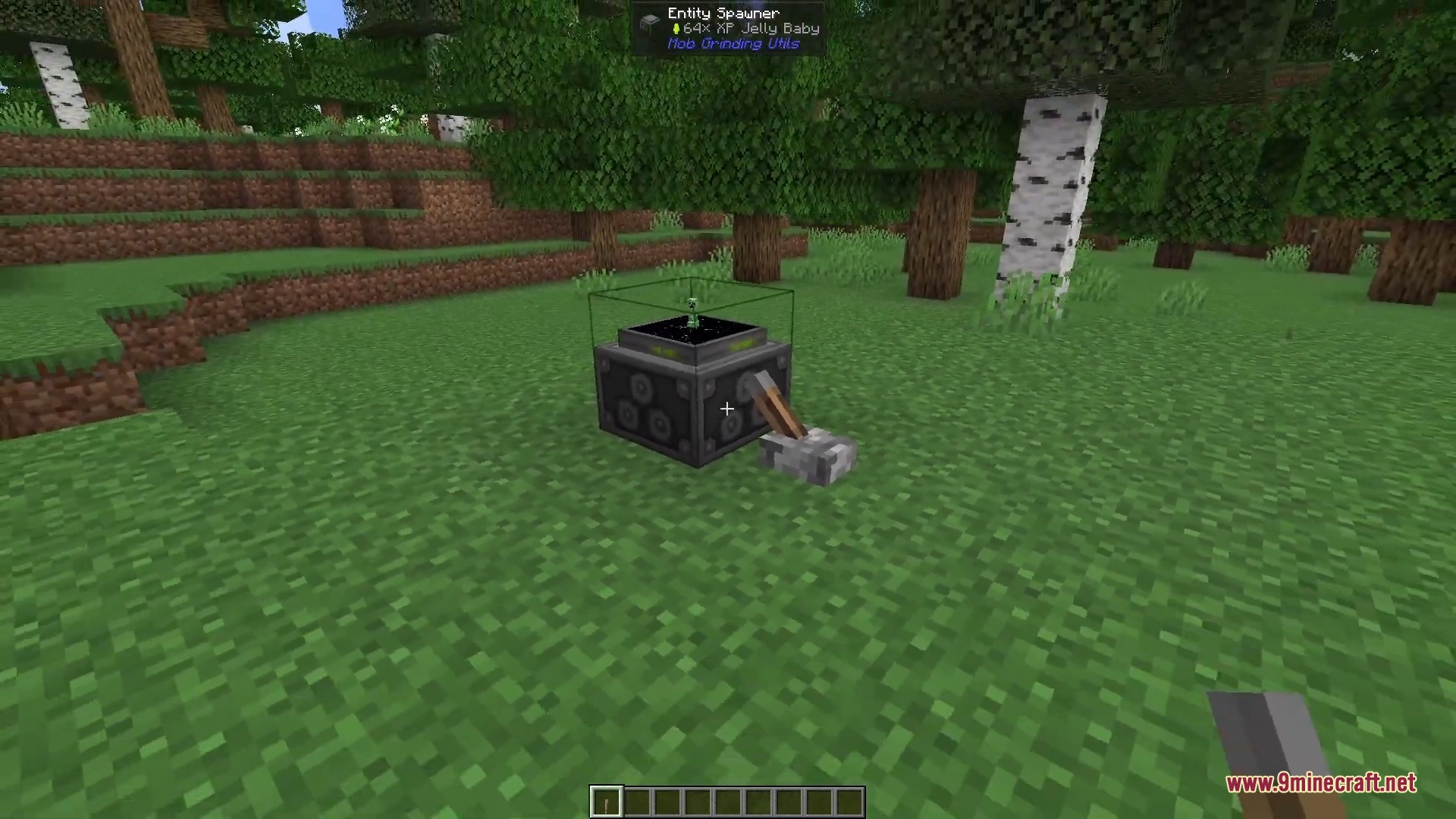 An Entity Spawner block with a lever attached sits in a forest clearing