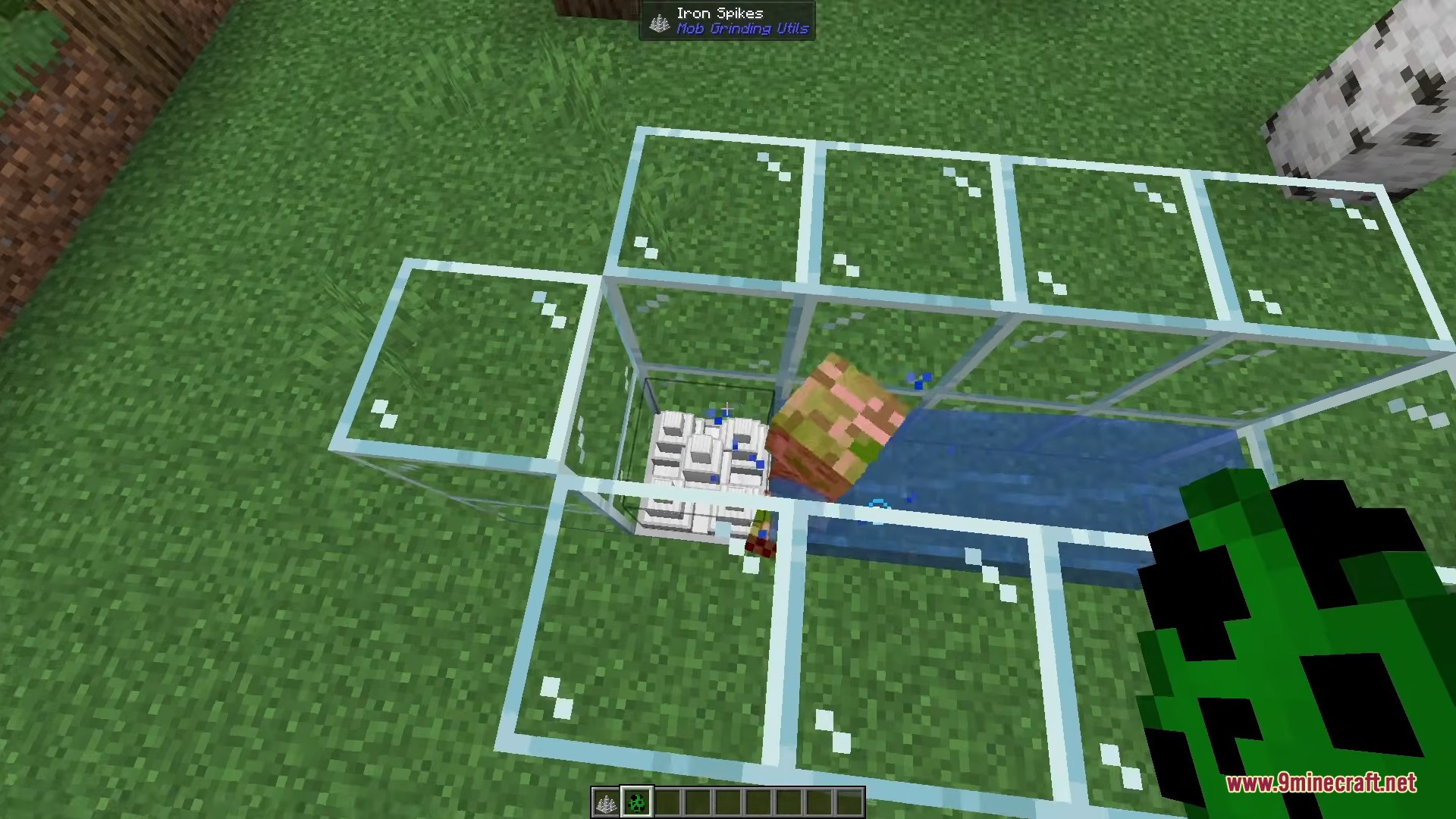 A zombie being killed by Iron Spikes in a water filled mob farm