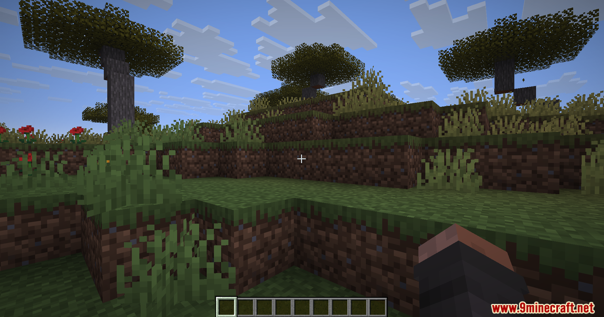 Modern UI Mvus Mod Screenshot 5 First person view of a Minecraft savanna biome with several acacia trees