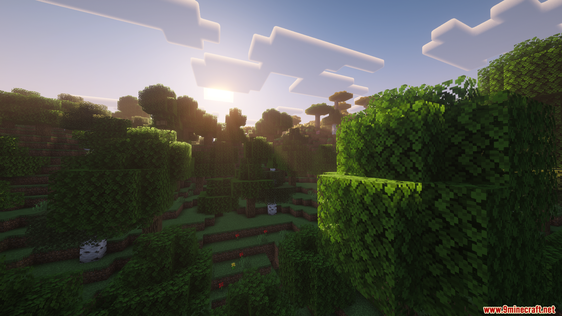 Monocle Mod Screenshot 6 Bright sun shining through trees on a grassy hillside in Minecraft