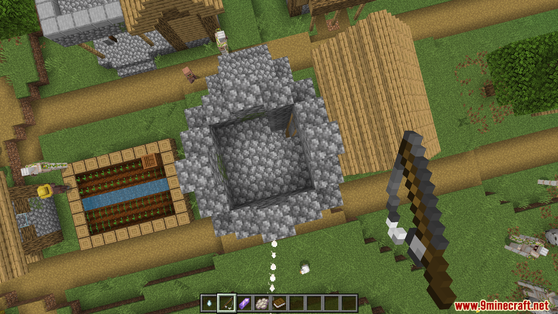 More Actions Addon Screenshot 6 Player uses the grappling hook to pull themselves high above a village