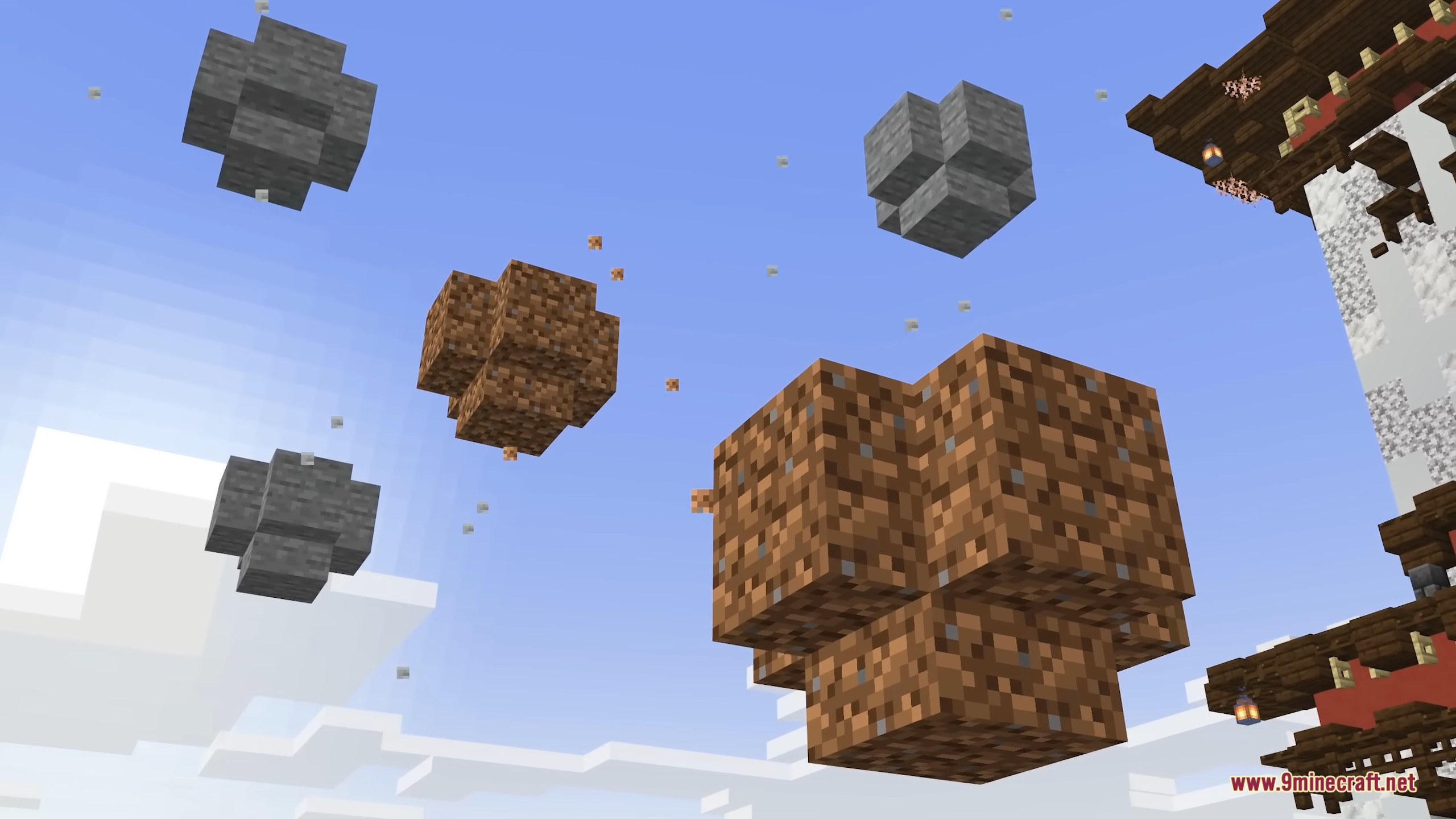 Large chunks of dirt and stone blocks floating in the clear sky