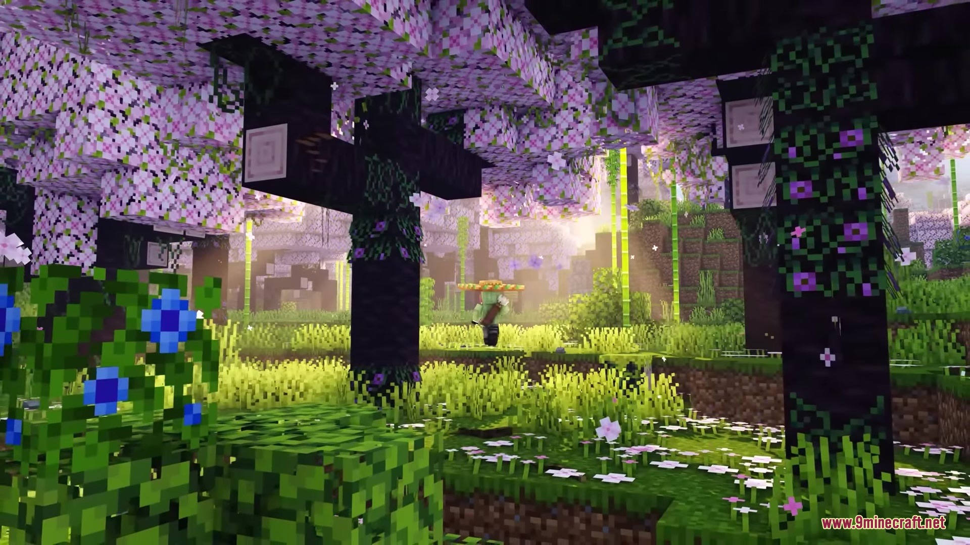 Musgo Resource Pack Screenshot 17 A character stands among pink flowering trees in a vibrant Minecraft forest
