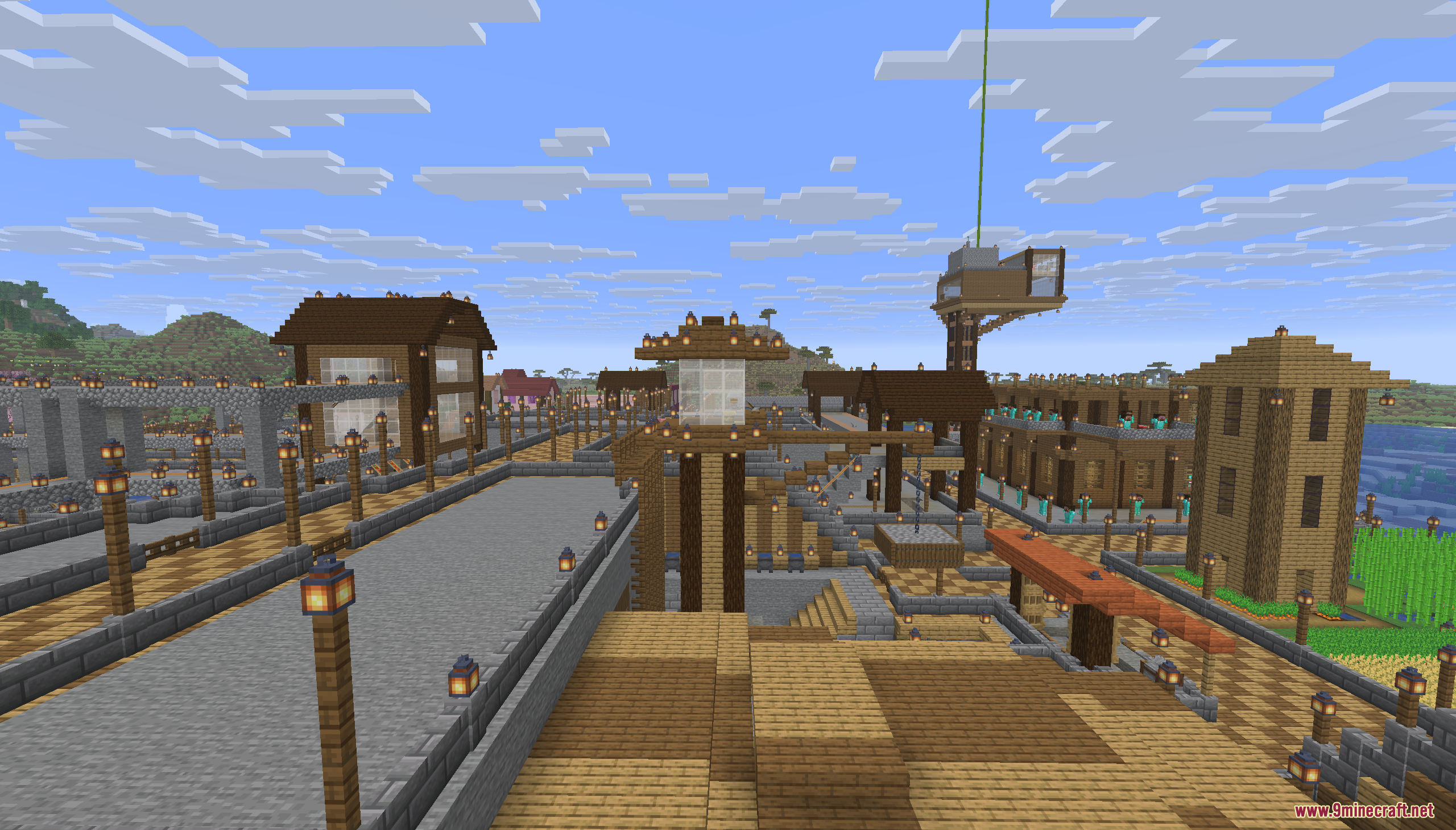 Wooden lamp posts line the stone streets of a town in Minecraft