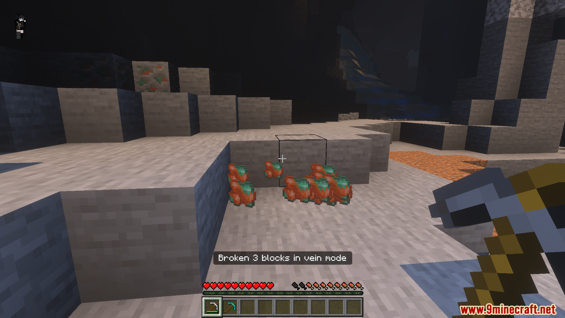 Player uses Naitangs Vein Miner Addon to break three copper ore blocks instantly