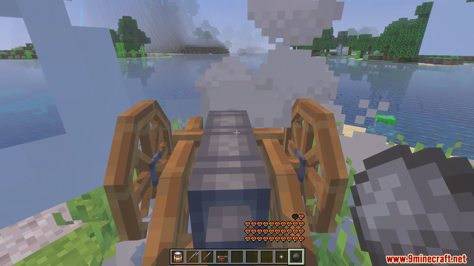 Player firing a large cannon from the Napoleonic Addon in Minecraft
